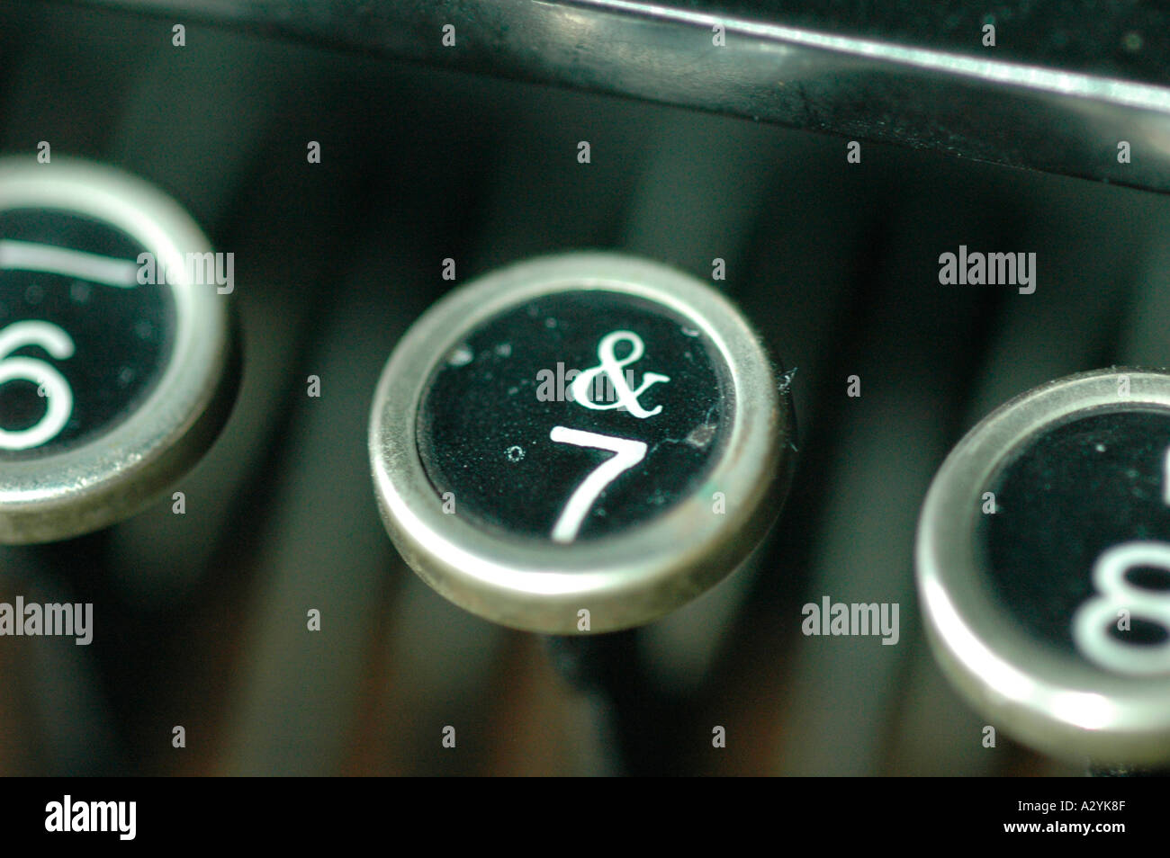 An Old manual typewriter with its working keyes with numbers and letters apersand and 7 Stock Photo