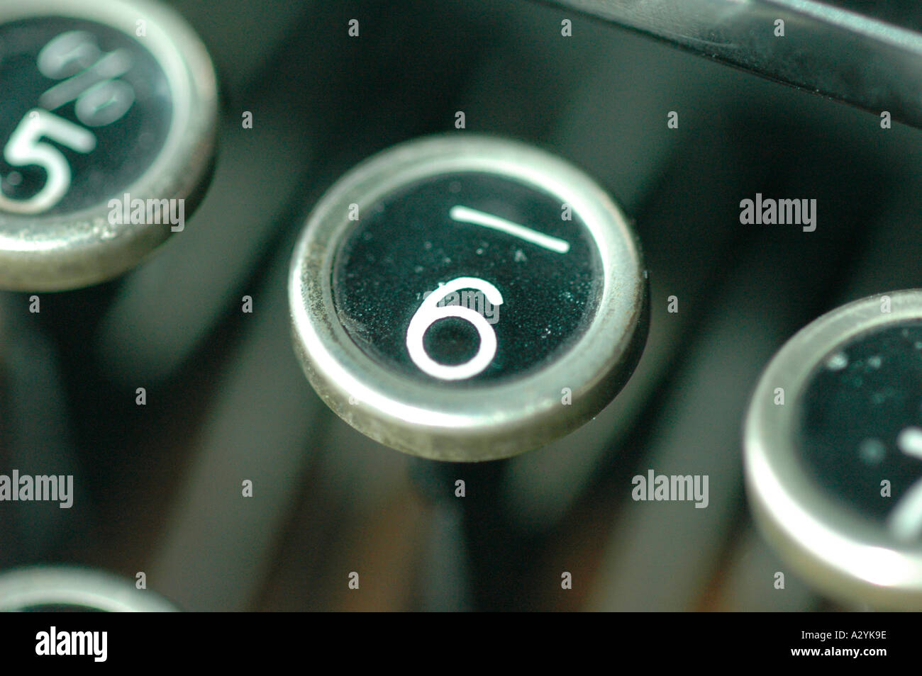 An Old manual typewriter with its working keyes with numbers and letters underline dash 6 Stock Photo