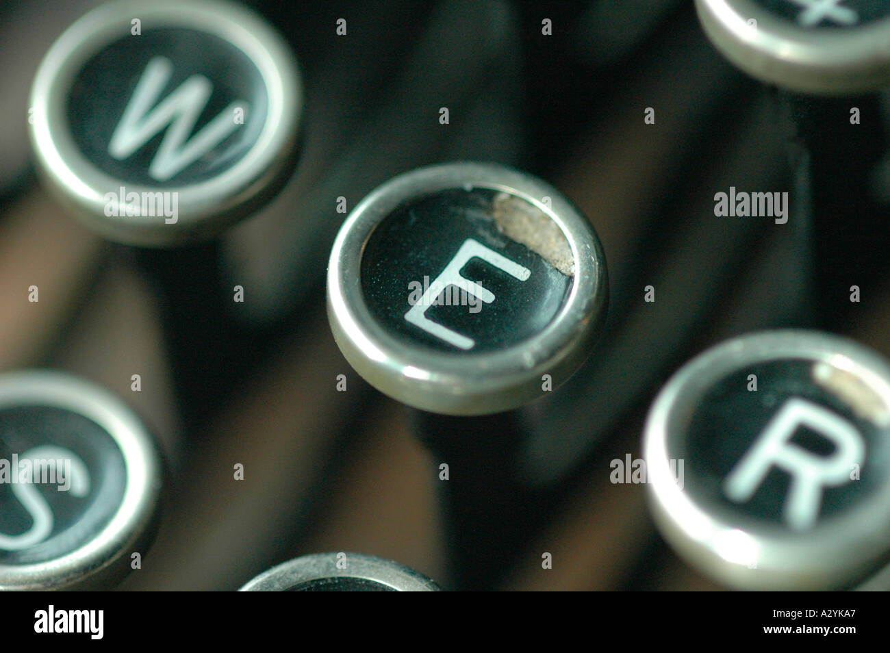 An Old manual typewriter with its working keys with numbers and letters ...