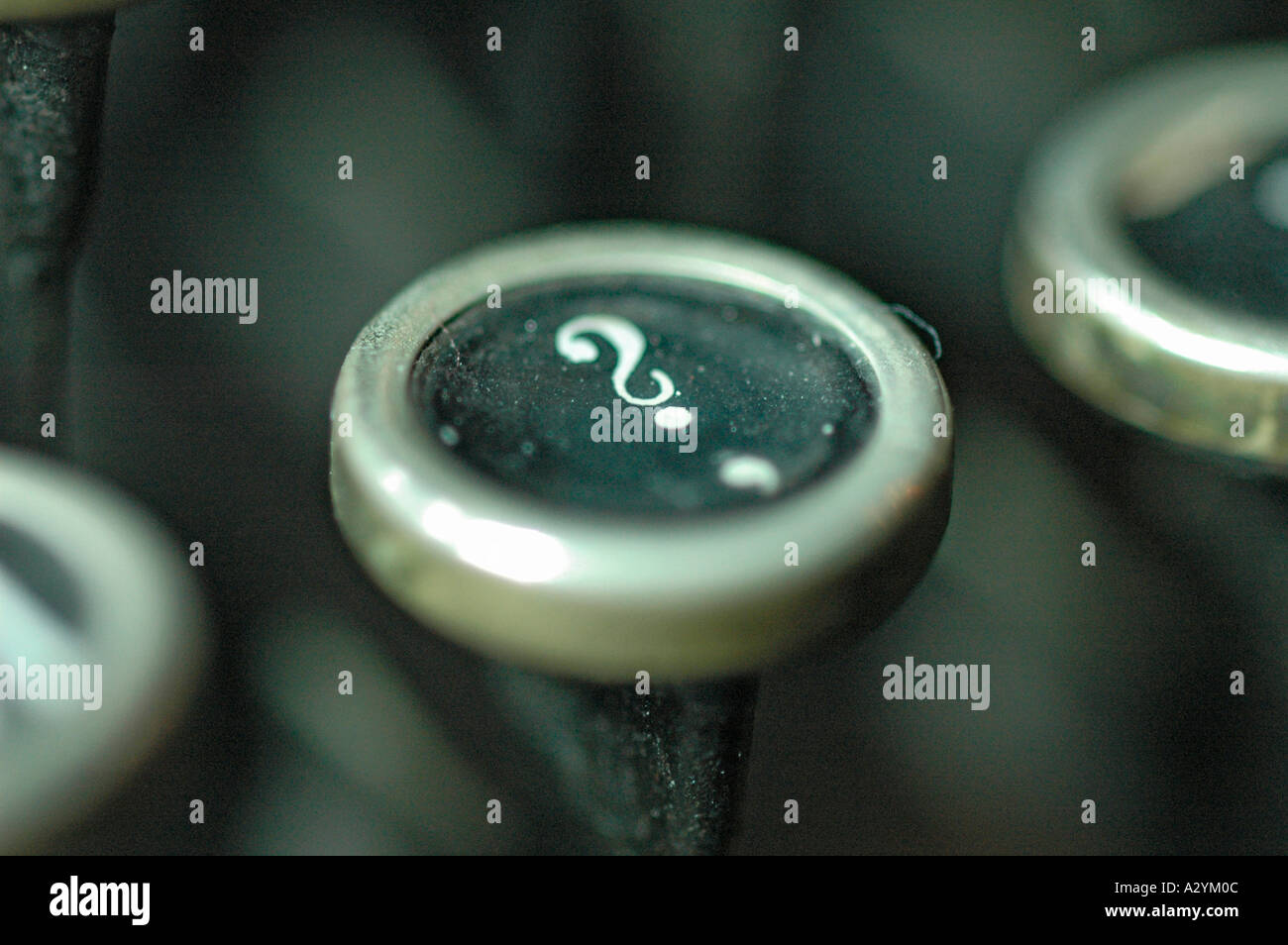 An Old manual typewriter with its working keyes with numbers and letters question markl Stock Photo