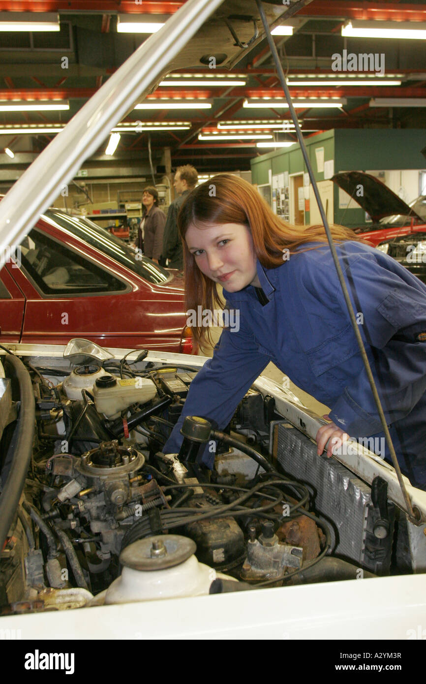 Motor Vehicle Technology NVQ female Student working on car engine at