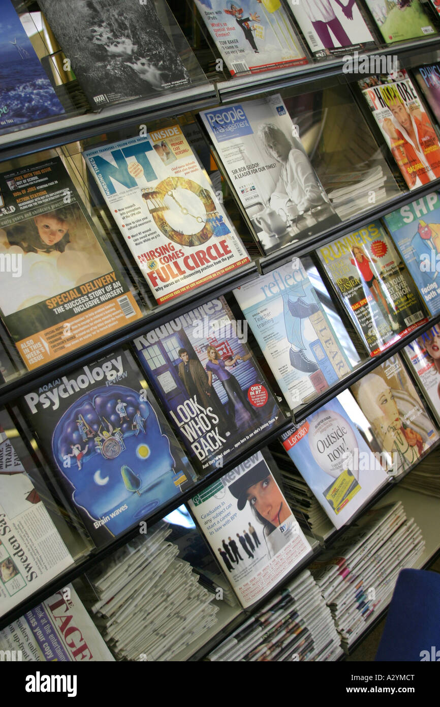 Magazine rack in sixth form college library Stock Photo