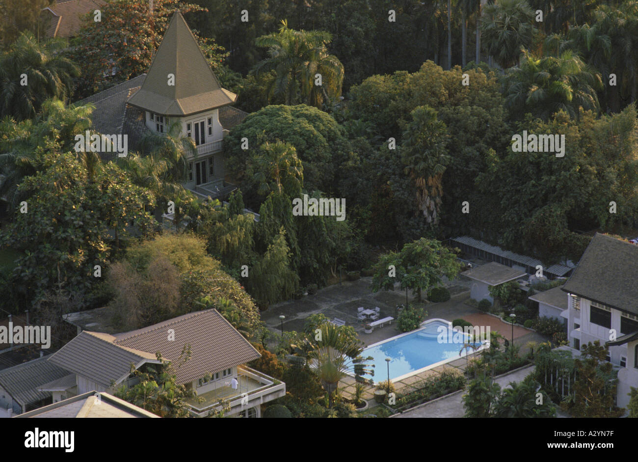 Aerial view of a beautiful garden and house hidden by walls in the centre of bangkok, Thailand Stock Photo