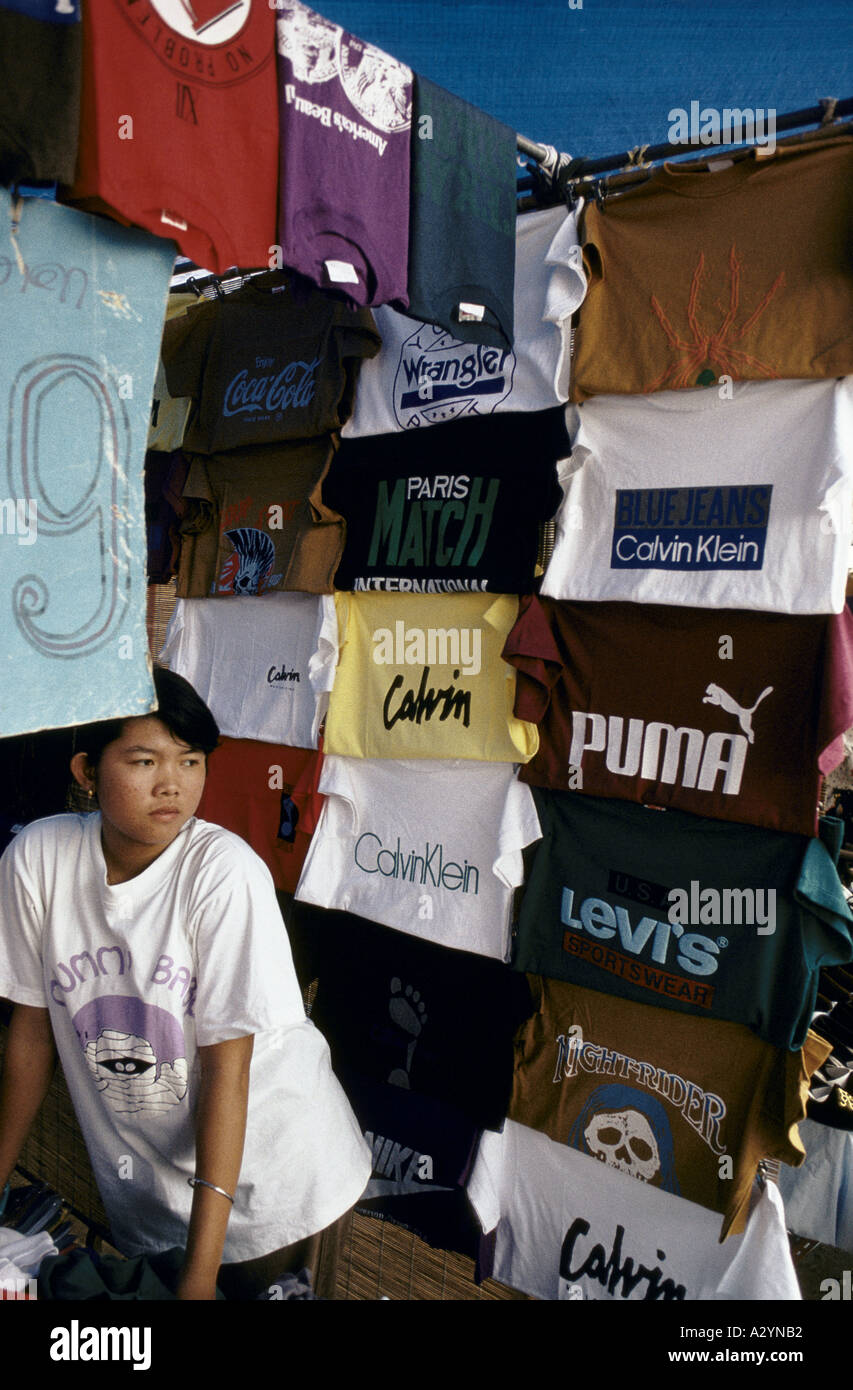 Fake designer T-shirts for sale in a market in Bangkok, Thailand Stock  Photo - Alamy