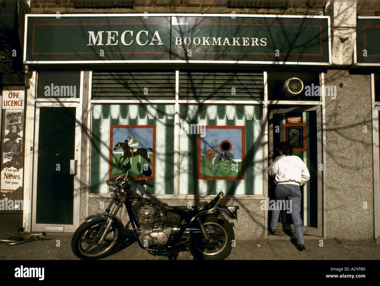 person-entering-mecca-book-makers-A2YP80.jpg