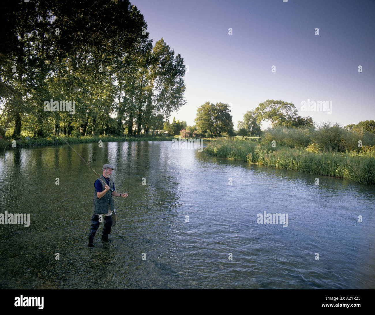 fly fishing for trout on river test houghton club hampshire Stock Photo