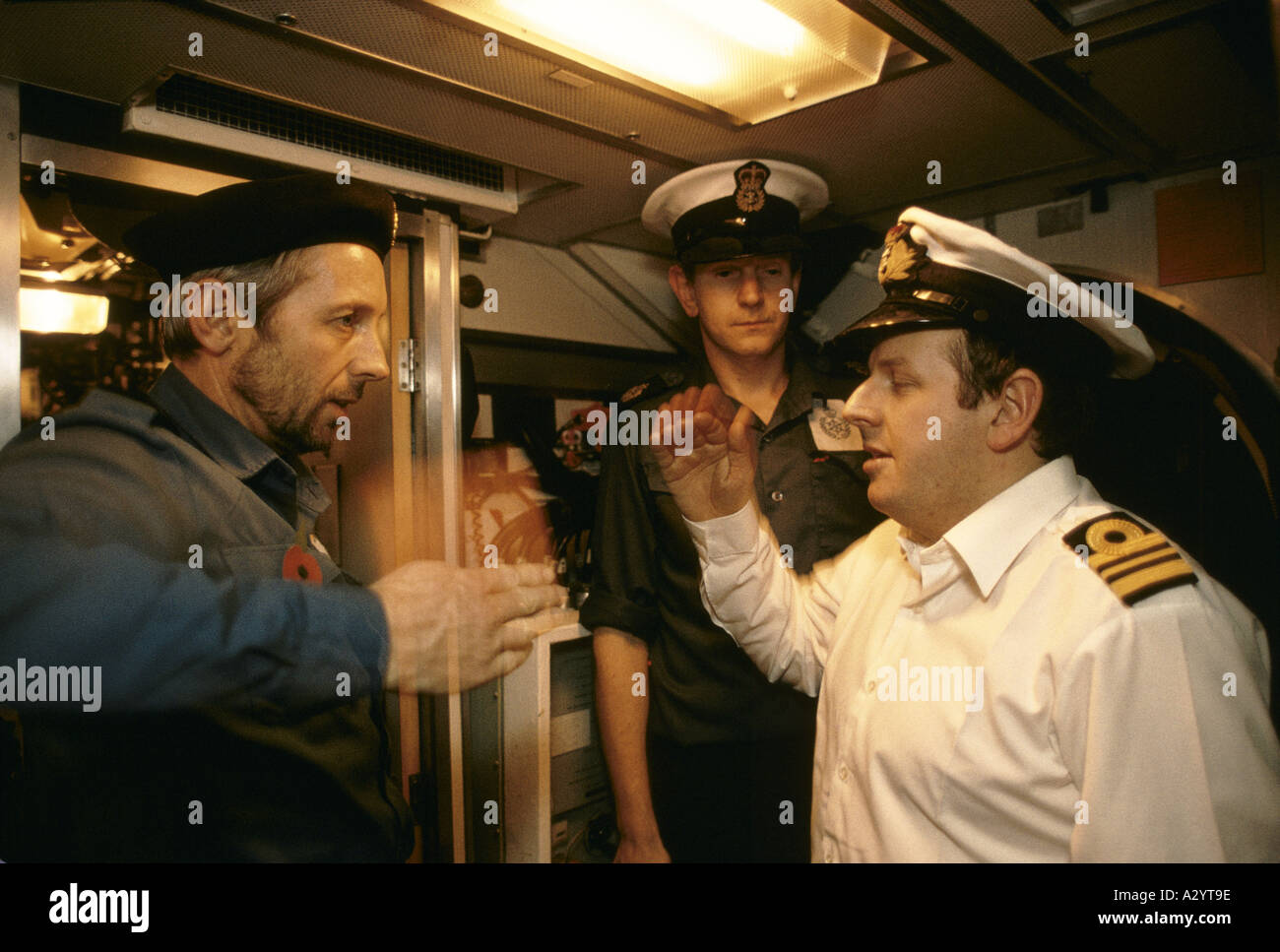 first mates inspection of submarine cabin Stock Photo