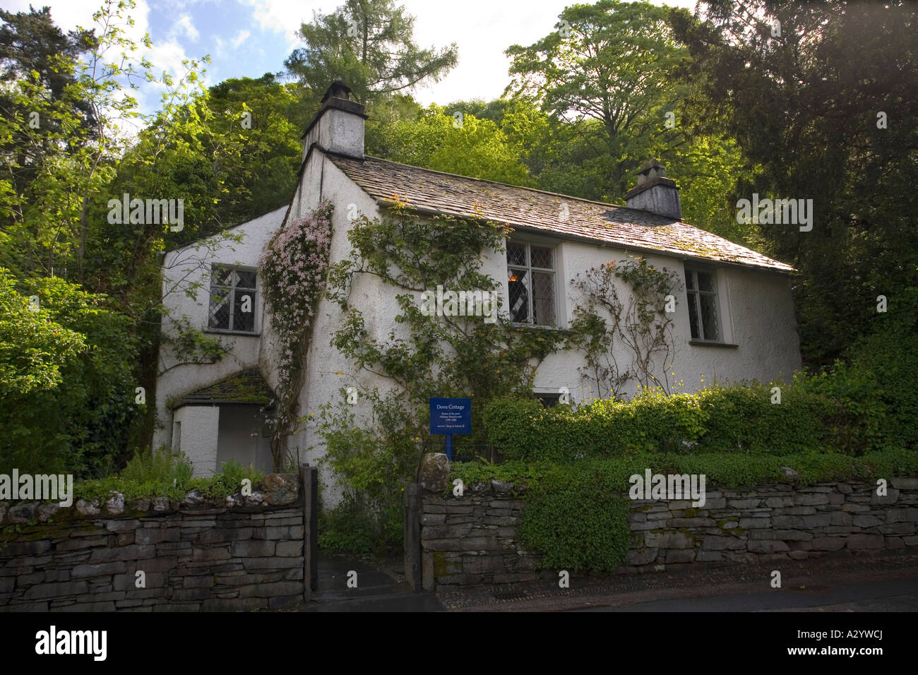 Dove Cottage in the Cumbrian village of Grasmere home to the famous romantic poet  William Wordsworth Lake District England Stock Photo