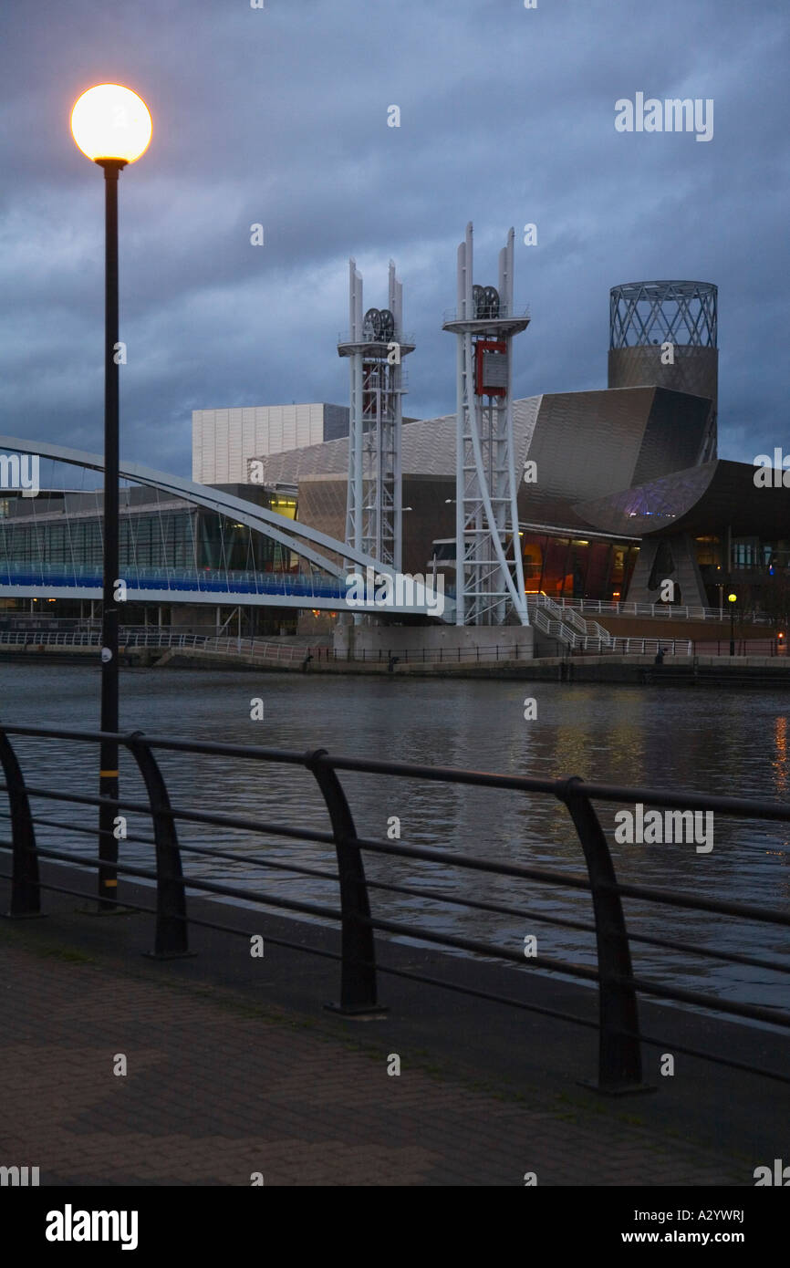 Lowry Art Centre and Millenium Bridge over the Manchester Ship Canal Salford Quays in evening light Manchester Lancashire UK Stock Photo