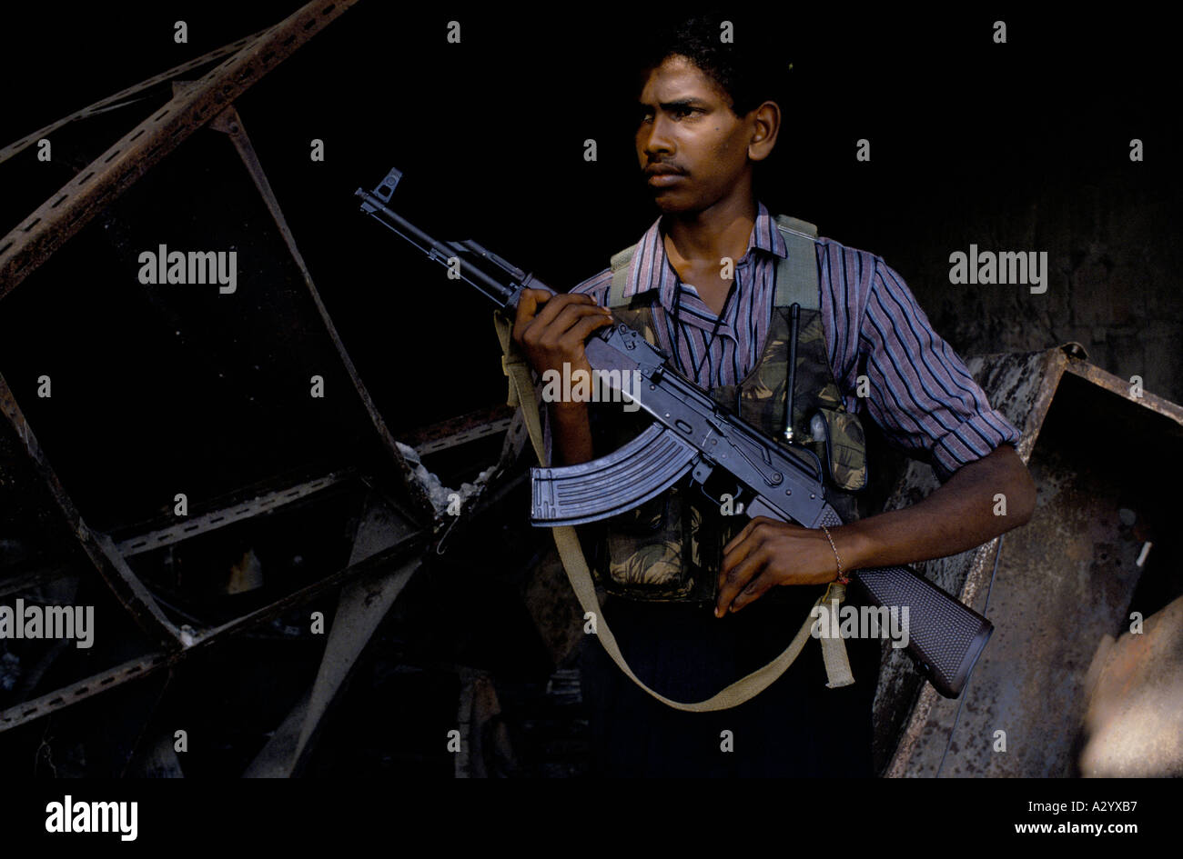 Tamil holding gun hi-res stock photography and images - Alamy