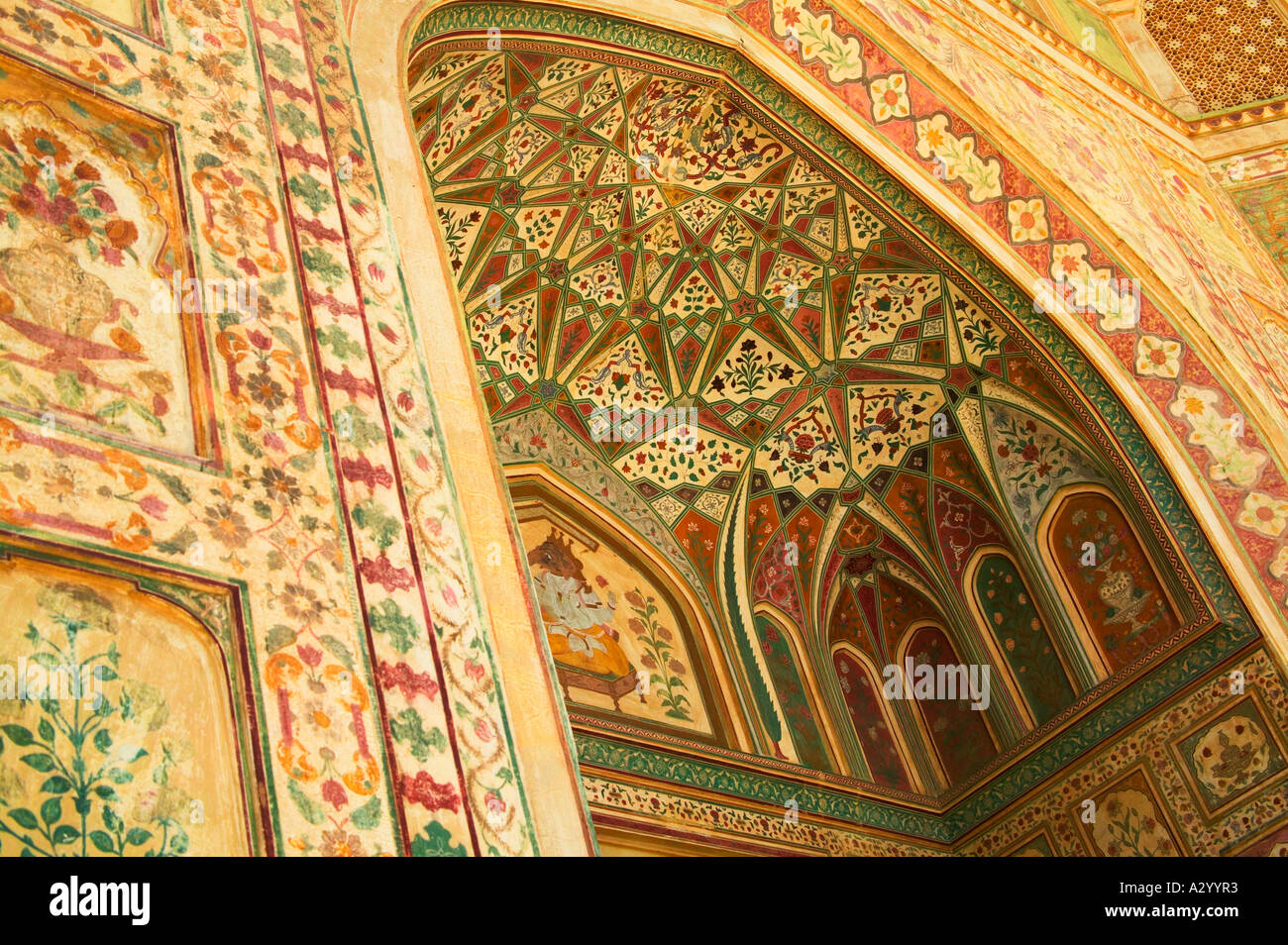 Ornate arcade decorated with tileworks inside Amber Palace Jaipur Rajasthan India Stock Photo
