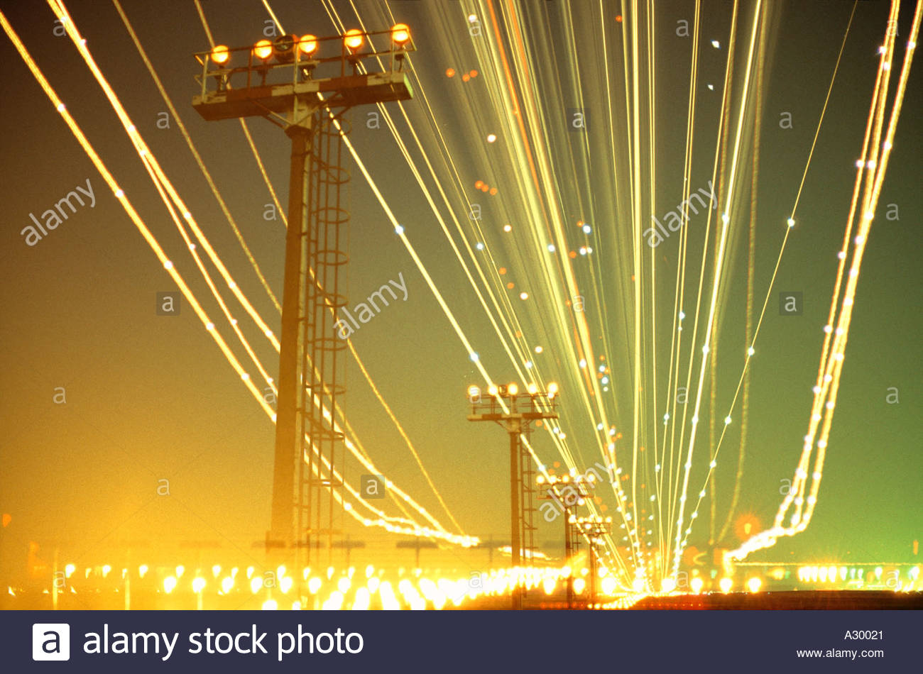 airport air traffic night landing lights runway streaks runway remaining lights