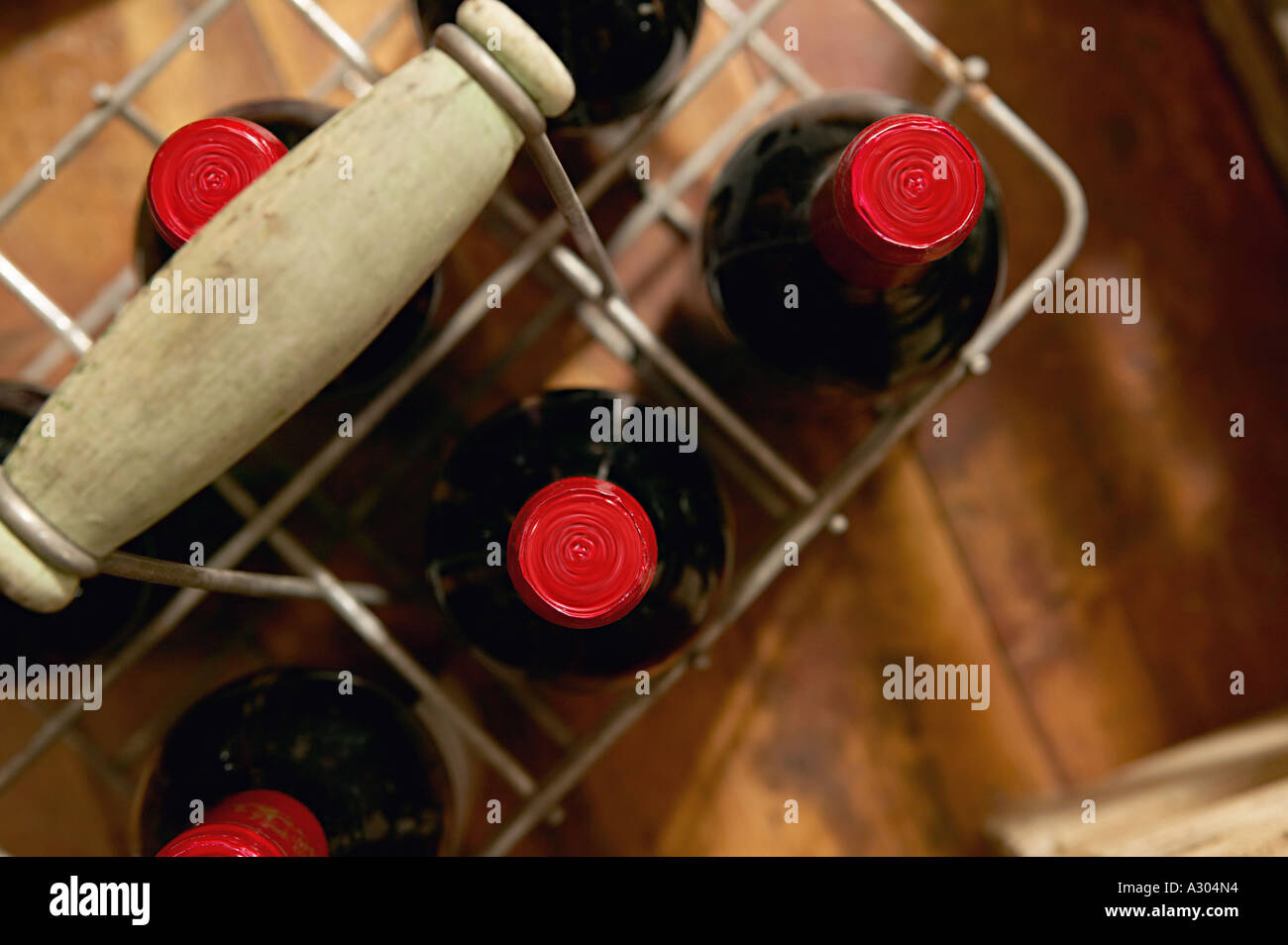 Wine bottles in basket Stock Photo Alamy