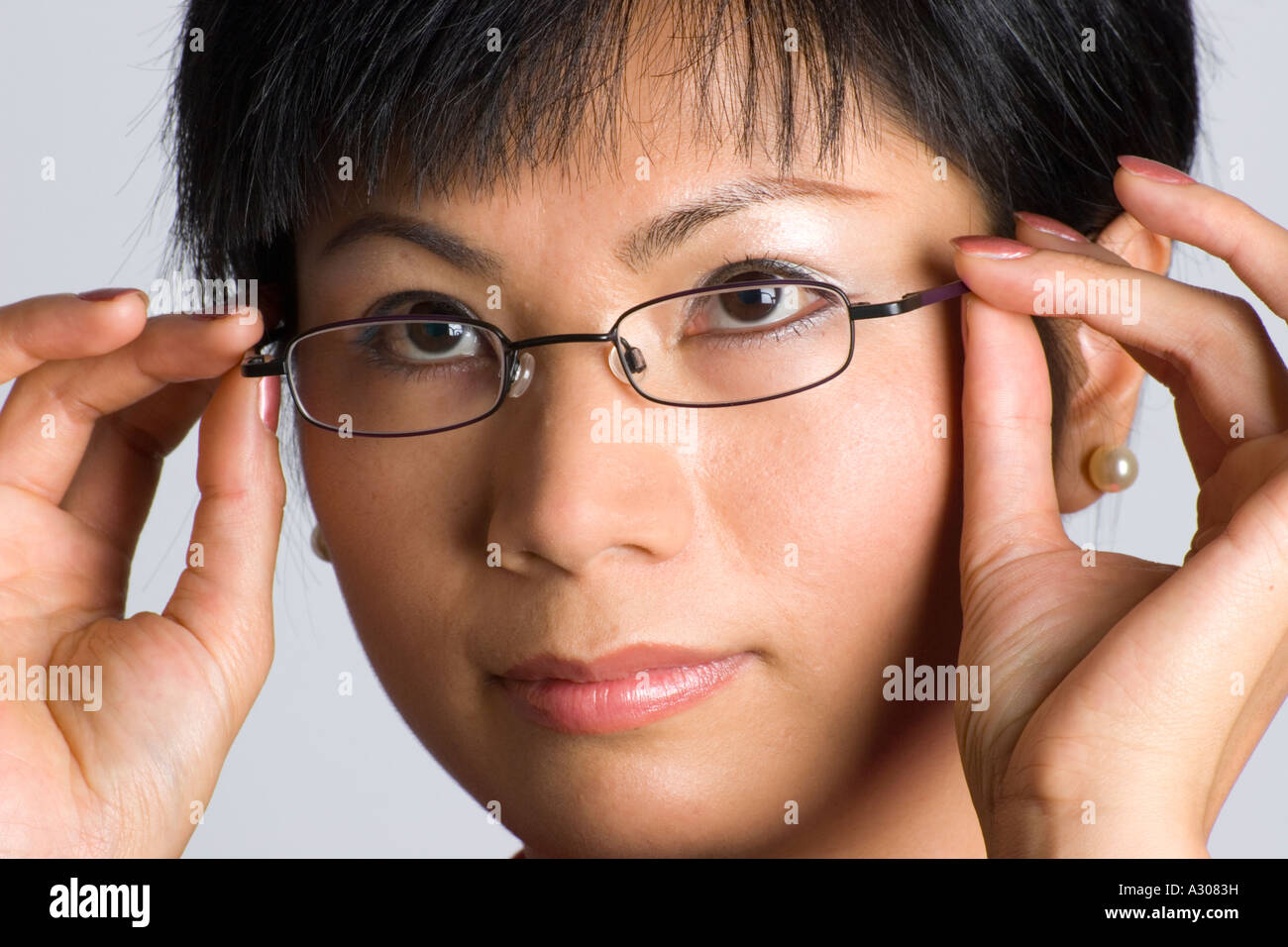 Chinese woman wearing spectacles Stock Photo Alamy