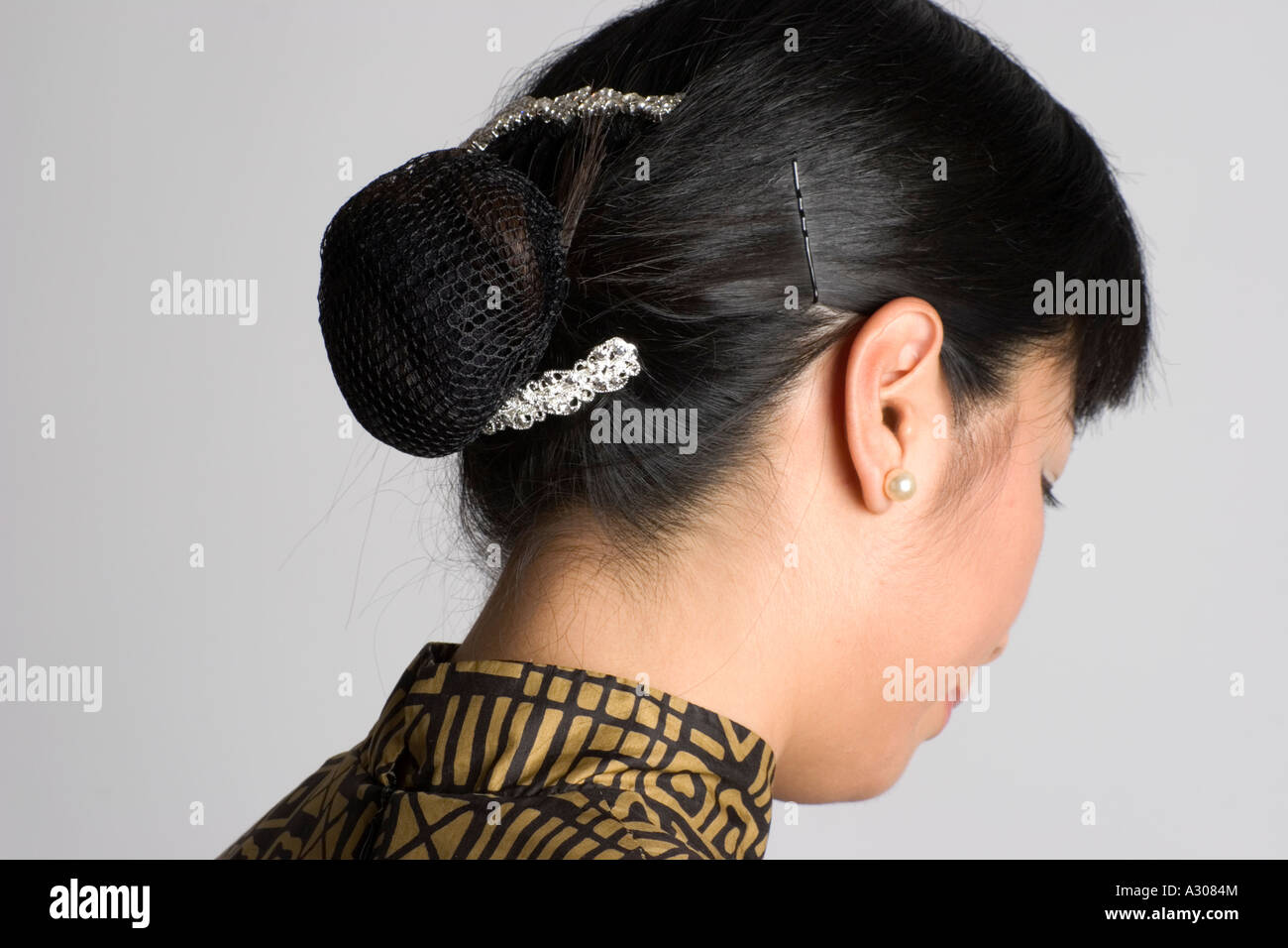 Chinese woman with hair tied back Stock Photo - Alamy Chinese woman with hair tied back Stock Photo - Alamy