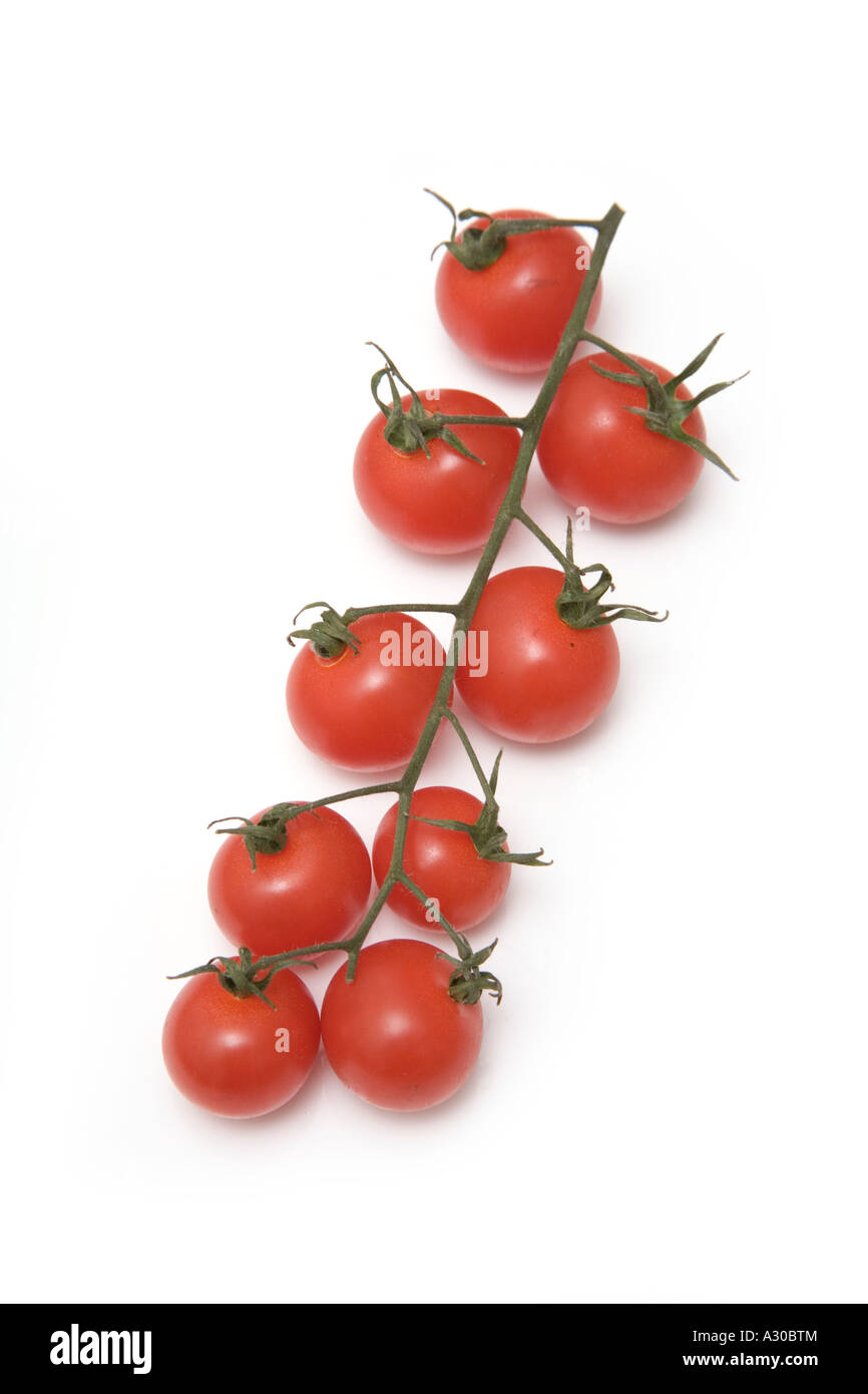 Cherry tomatoes isolated on a white studio background Stock Photo - Alamy