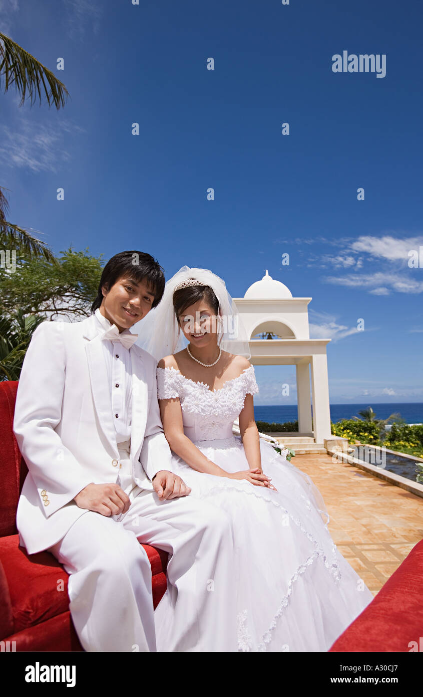 Newlyweds on horsedrawn carriage Stock Photo