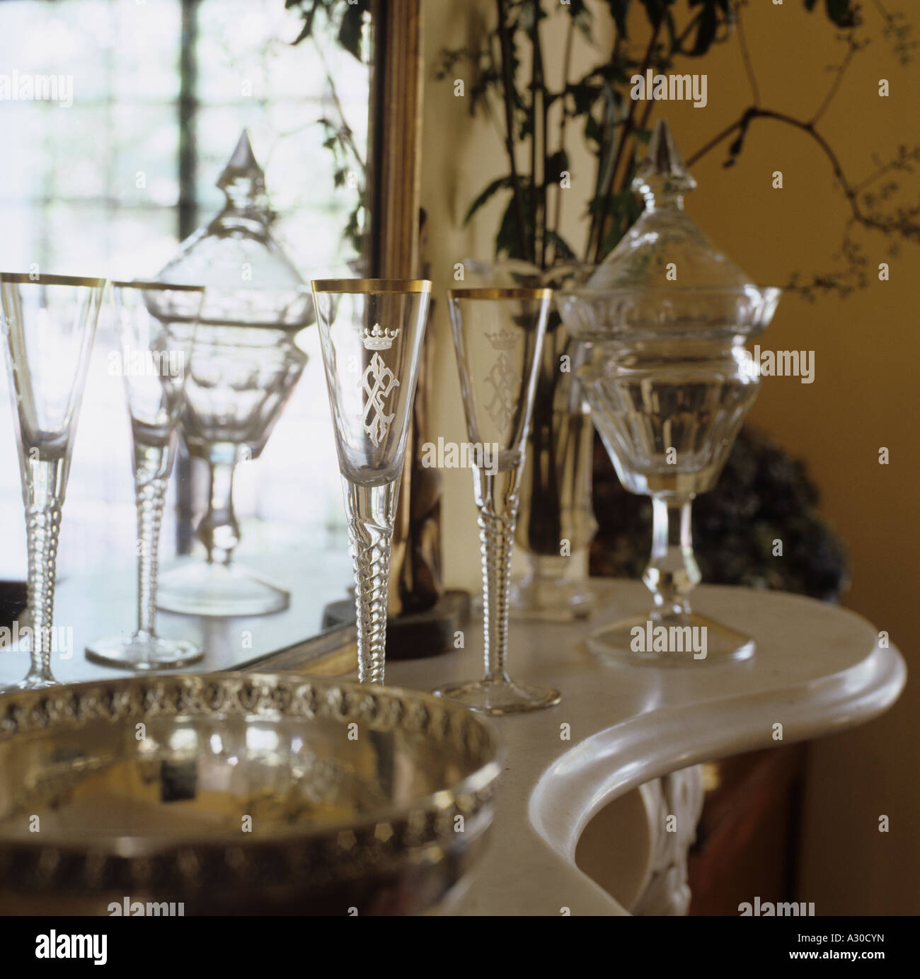 crystal glassware on marble tabletop Stock Photo Alamy