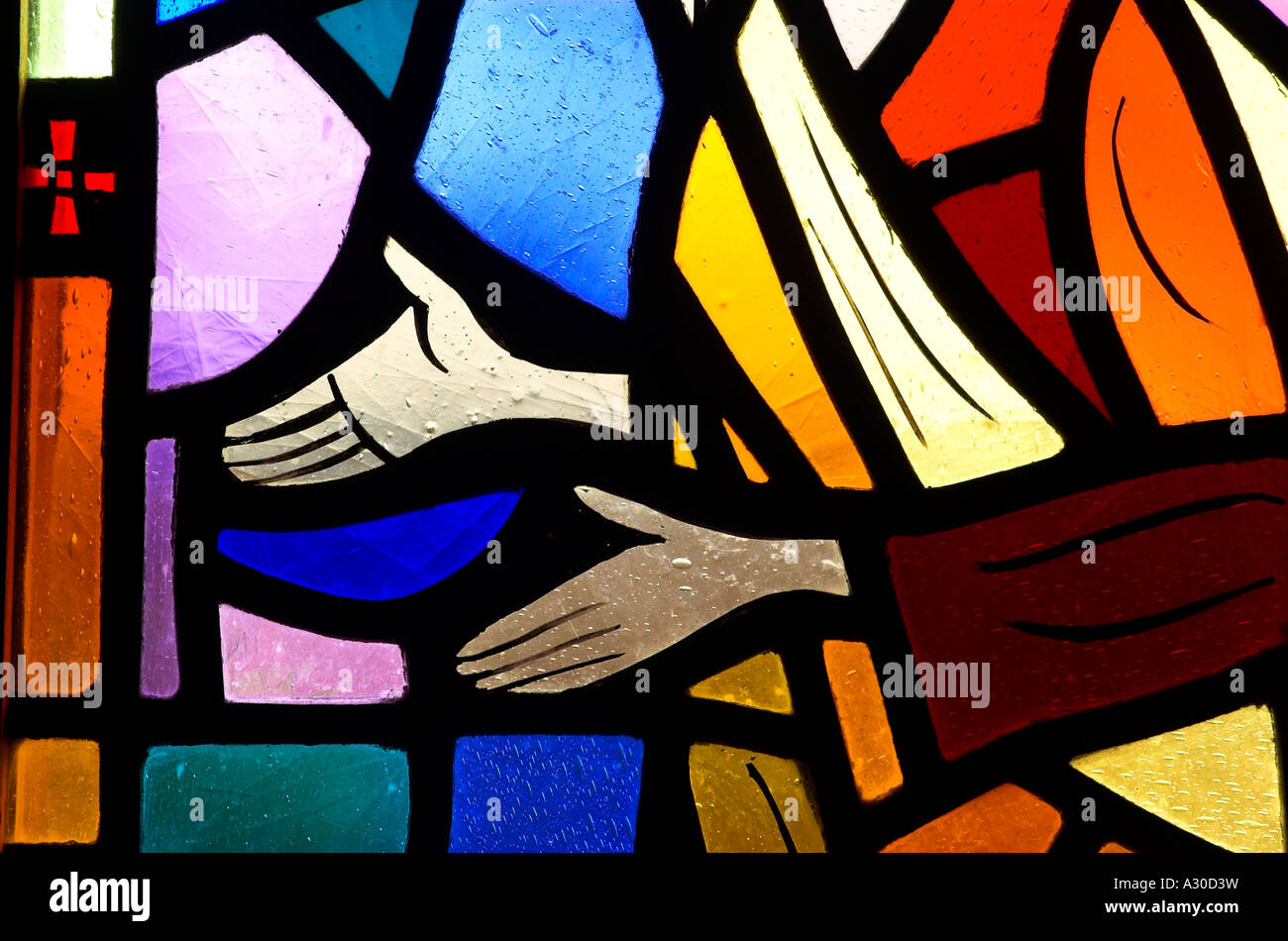 A stained glass window in the chapel at the benedictine monastery of Abbaye de St Benoit du Lac in Estrie, Quebec Stock Photo