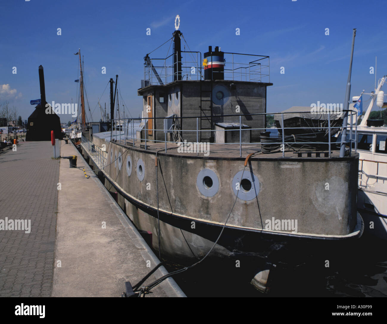 Preserved concrete ship Capella, moored at Rostock, Mecklenburg-Vorpommern, northern Germany. Stock Photo