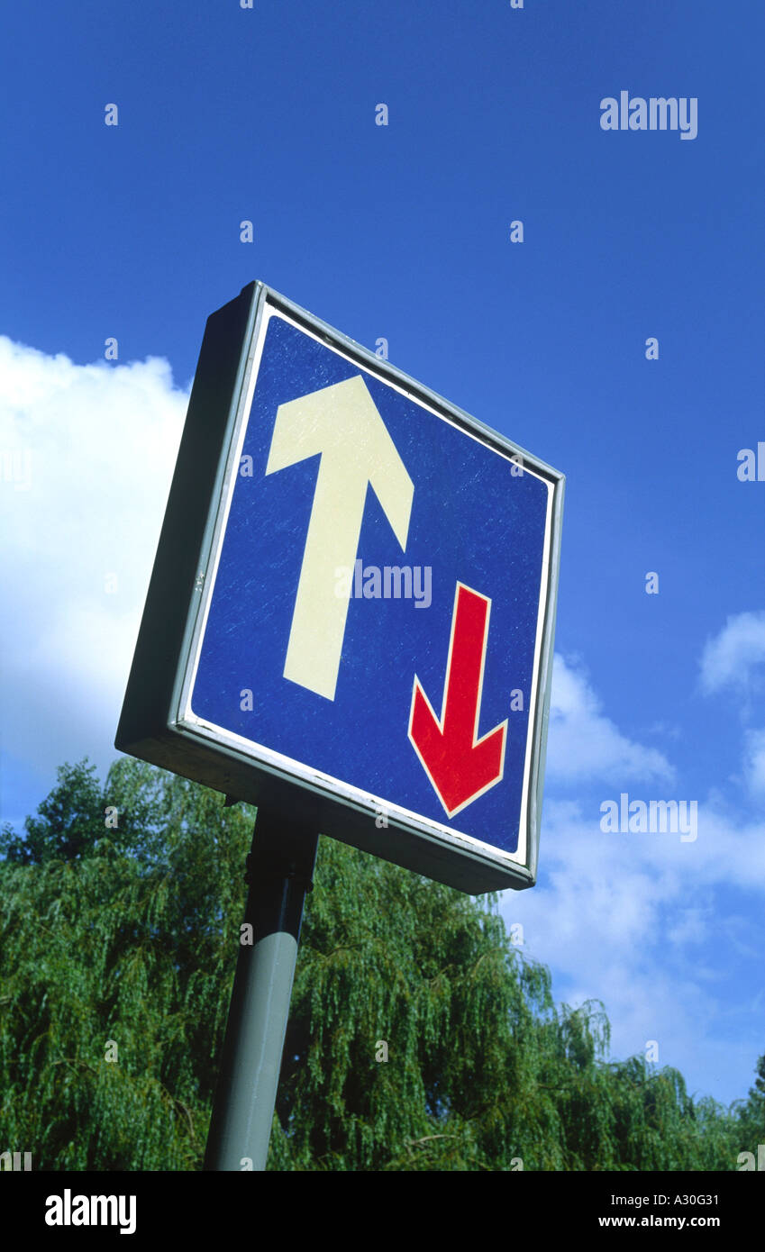 Road Sign with Arrows Pointing Up and Down Stock Photo Alamy