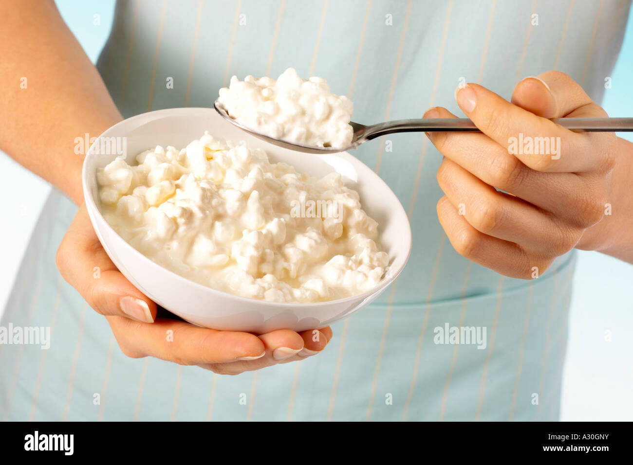Woman Eating Cottage Cheese Stock Photo 10630406 Alamy