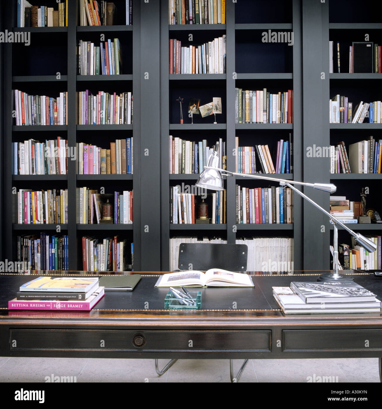 Bookcase in study of London townhouse Stock Photo Alamy