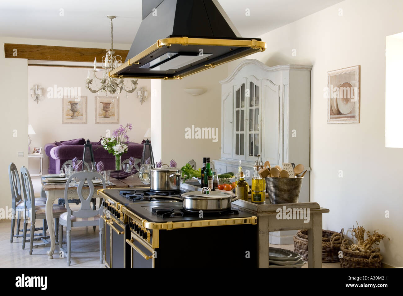 Extractor fan above oven hob open plan kitchen of Provençal holiday house Stock Photo Alamy