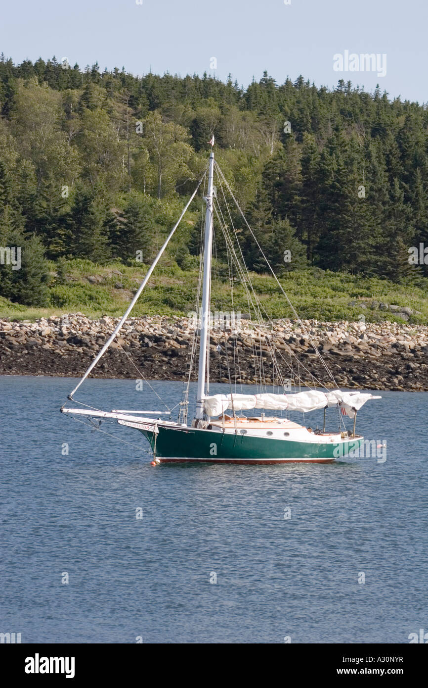 Here a Friendship Sloop is anchored in the east cove of Burnt Island in ...