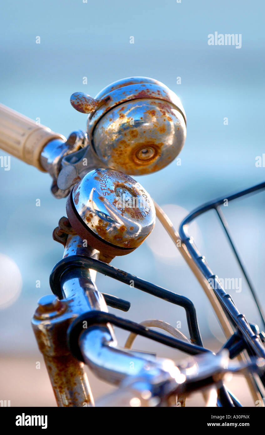 Two bells mounted on bicycle handlebars. Picture by Jim Holden Stock