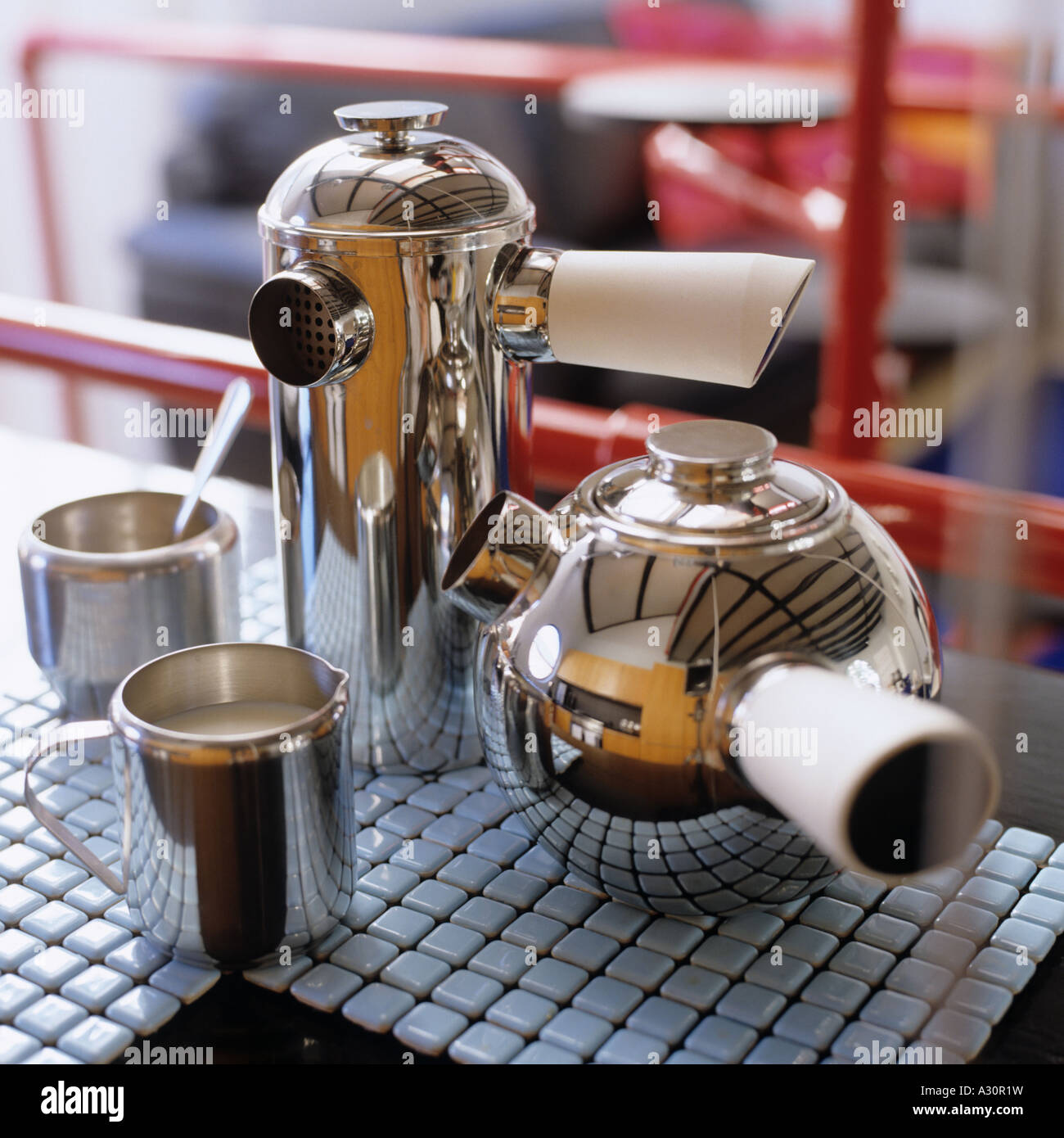 Metal coffee pot, milk jug and sugar bowl Stock Photo