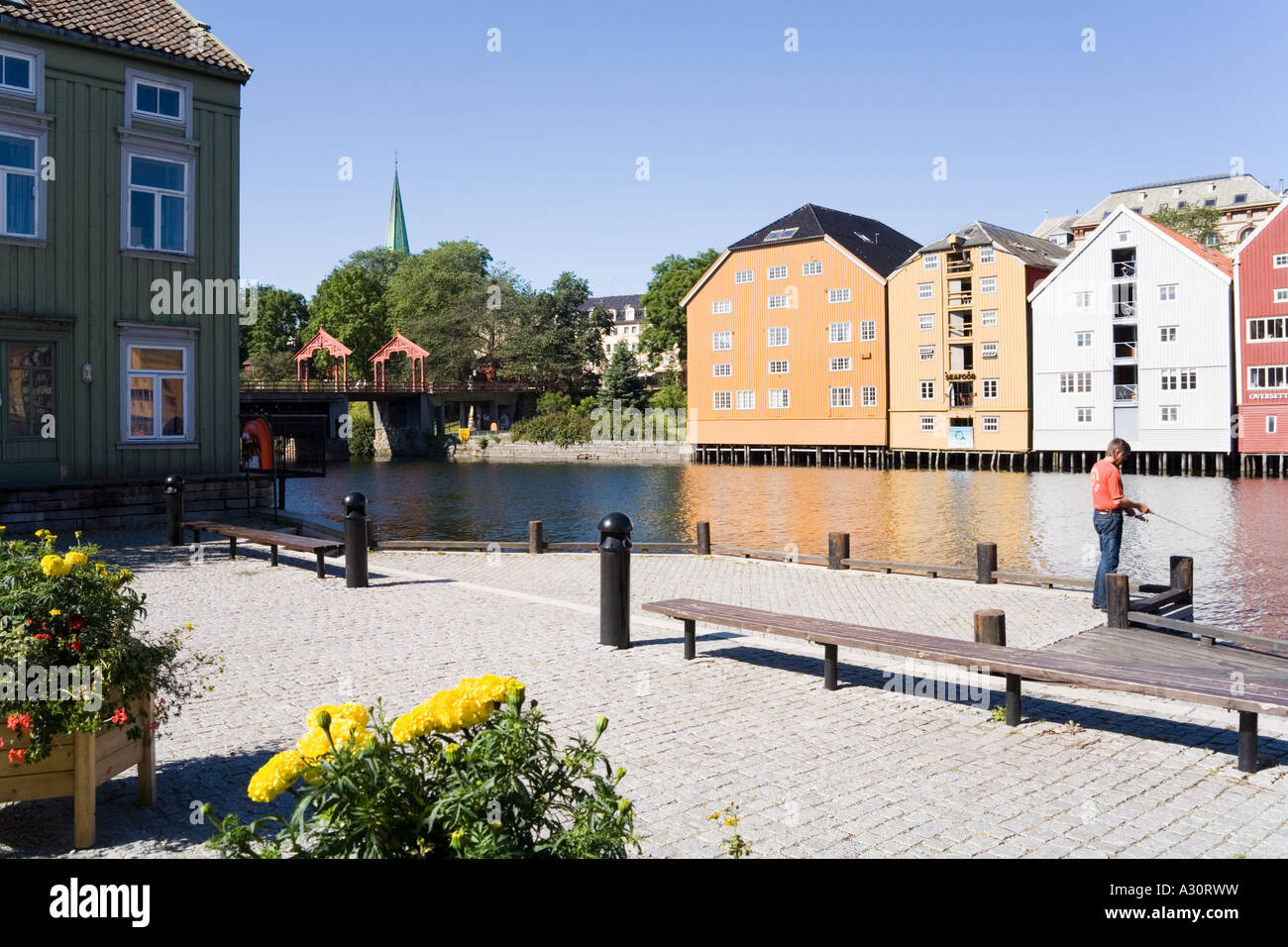 Wooden buildings on stilts along the Nidelva riverfront at Trondheim ... - Norway Riverfront High-End Apartments