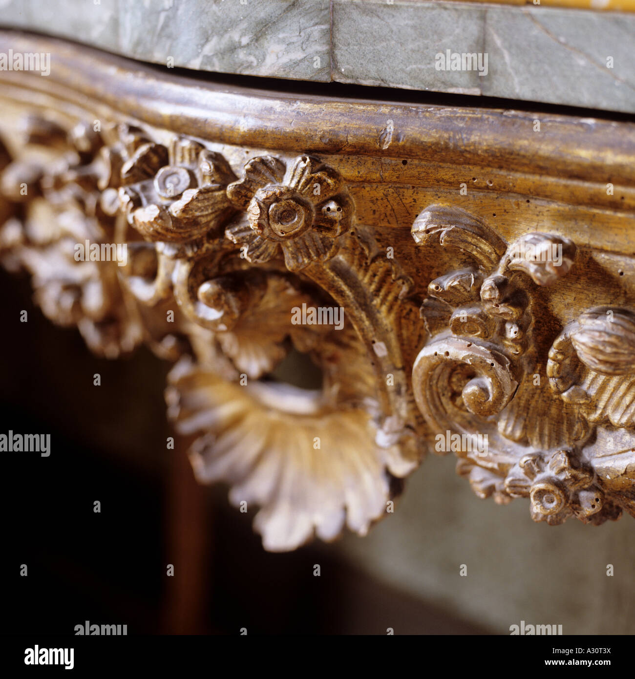 carved detail on an antique console table Stock Photo