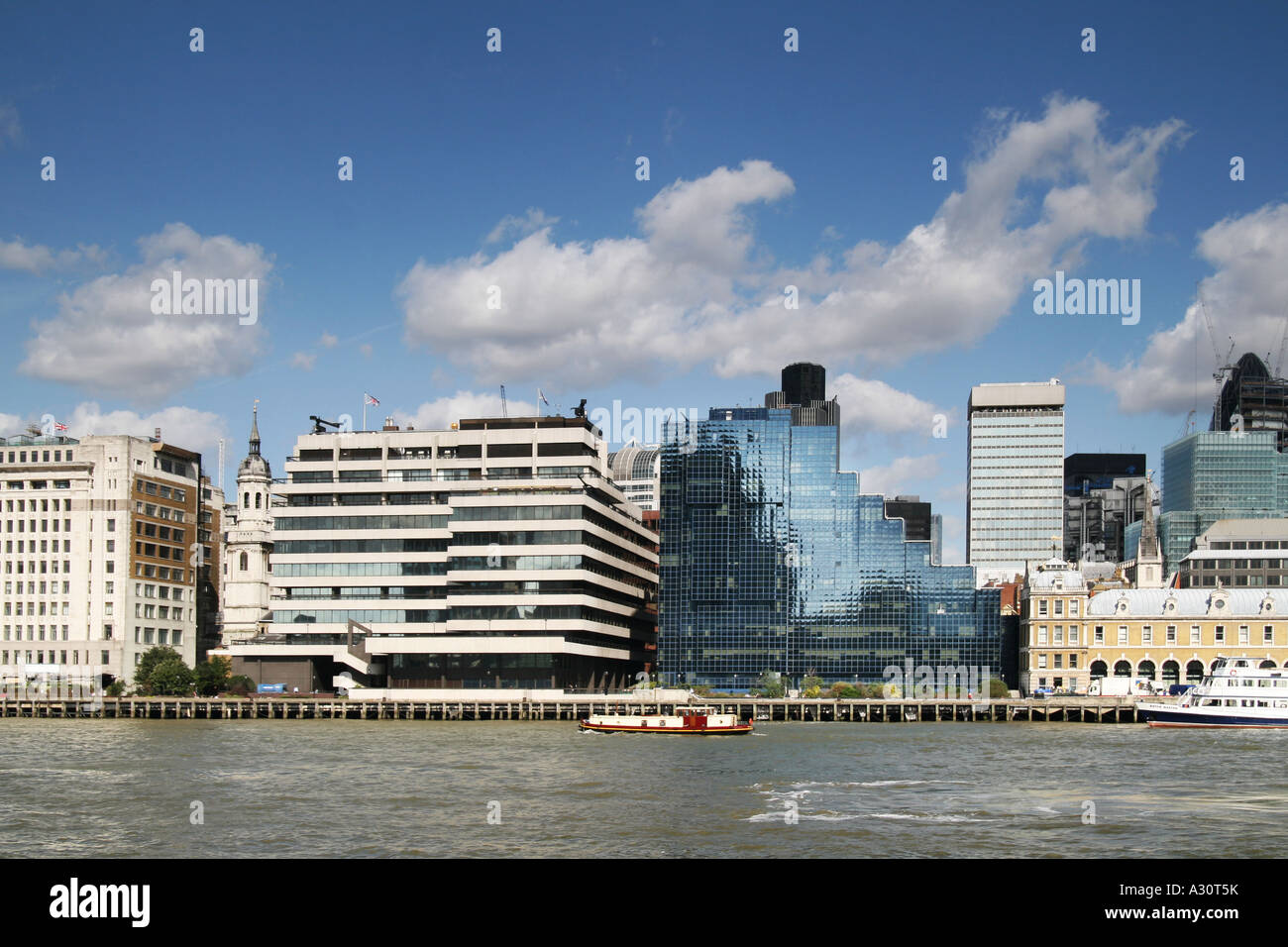 skyline of office buildings on the banks of the river thames london Stock Photo