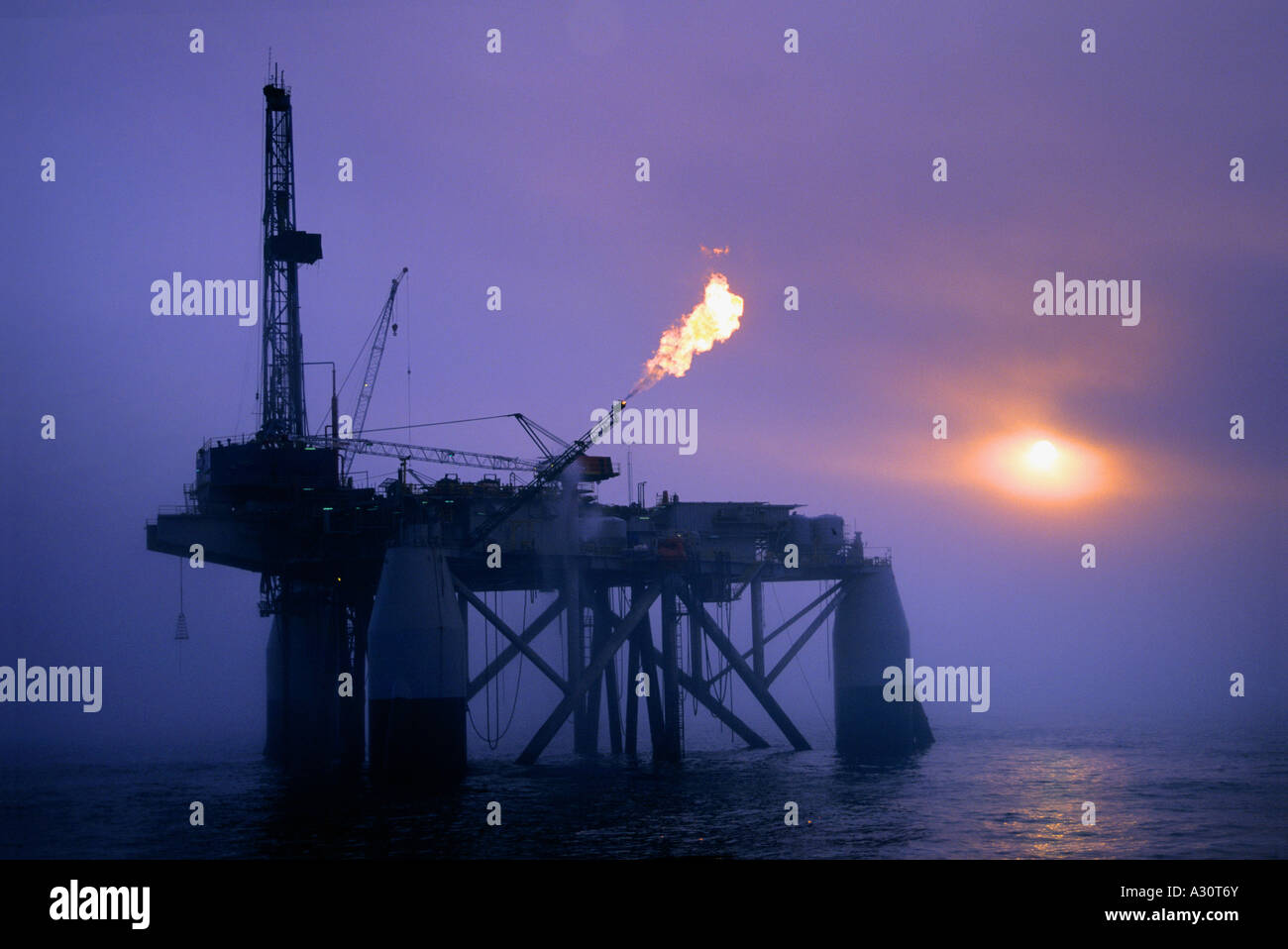 Submersible type rig flare testing a newly completed well offshore Louisiana in the Gulf of Mexico Stock Photo