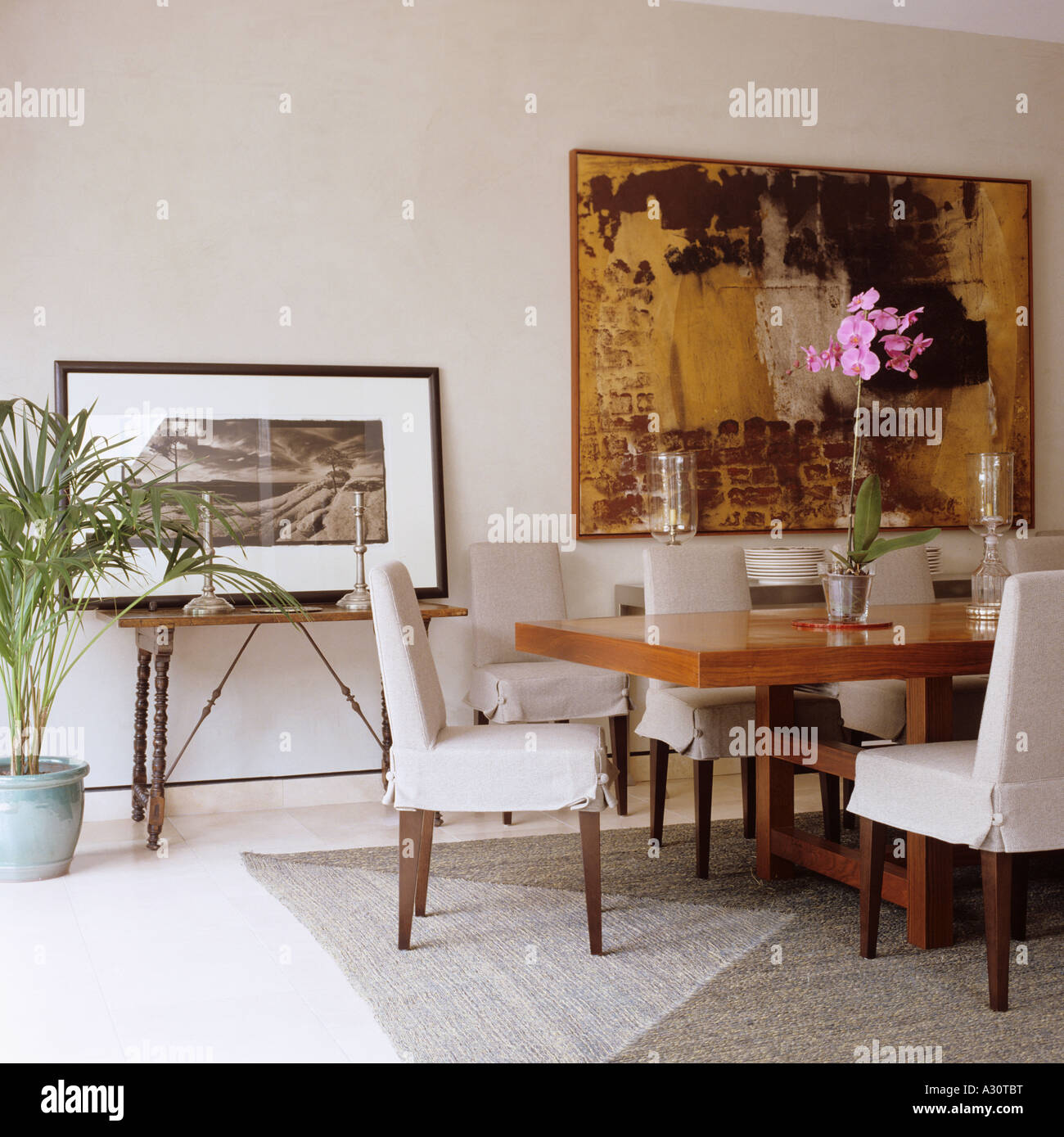 dining table and artwork in a contemporary London house Stock Photo Alamy