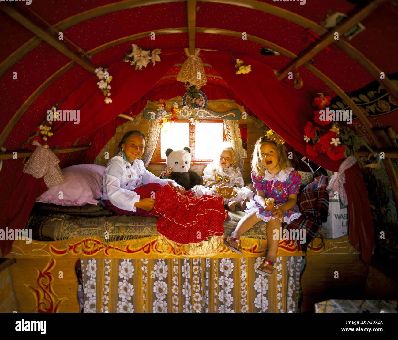 romany gypsy children in their family caravan Stock Photo