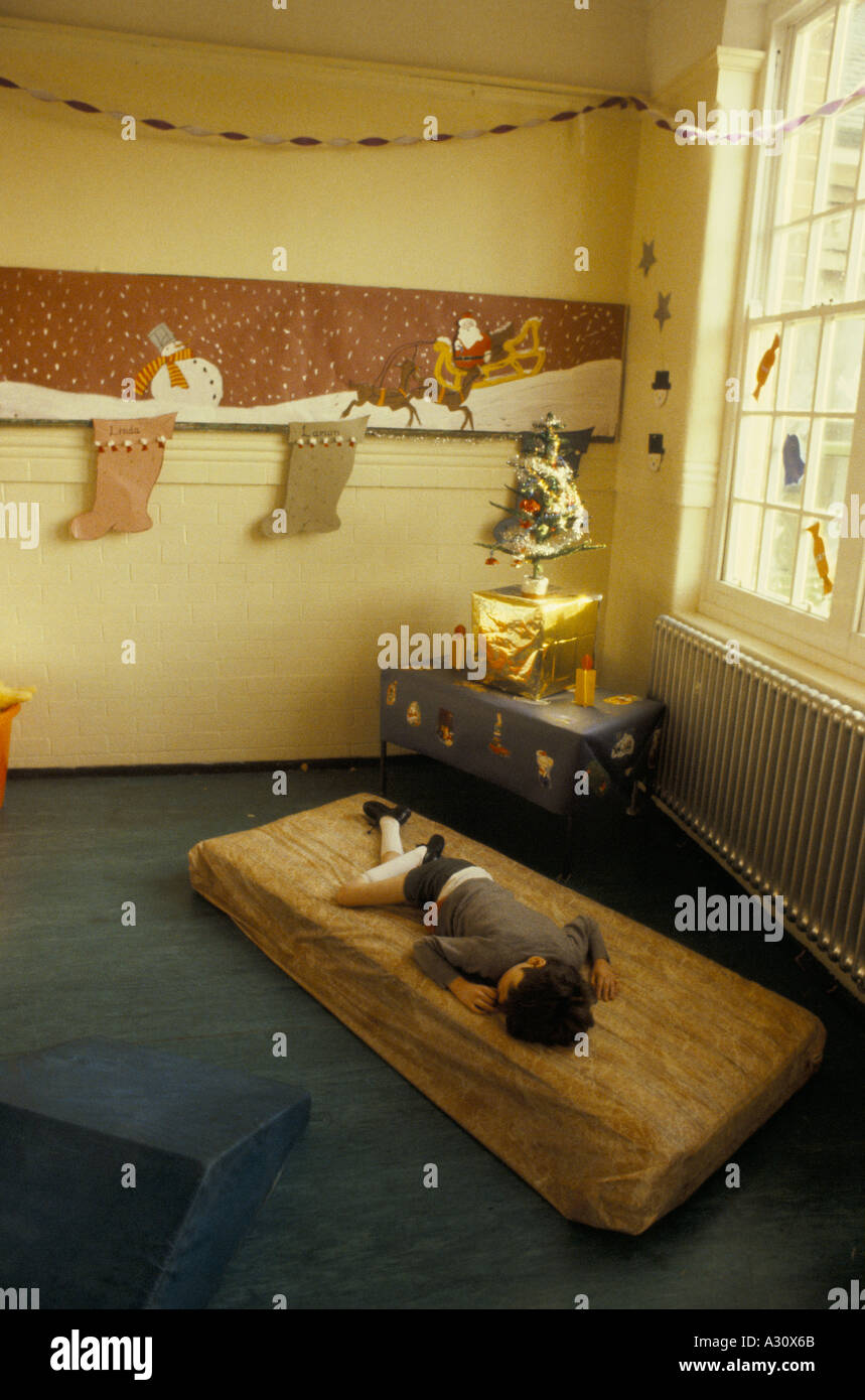 mentally handicapped child in home christmas decorations no model release Stock Photo