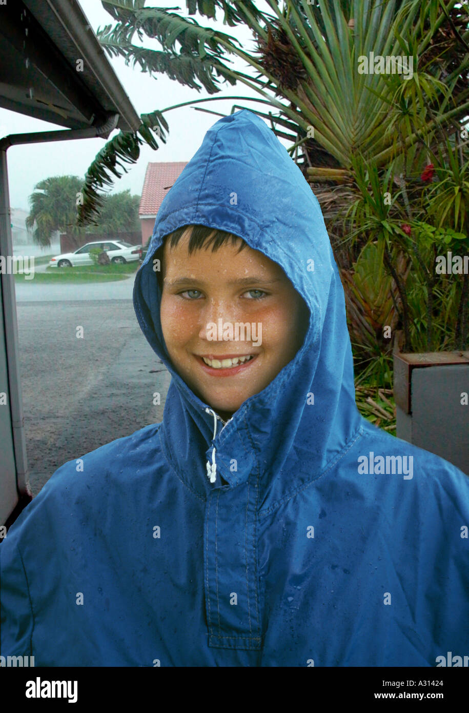 Boy with Raincoat Stock Photo Alamy
