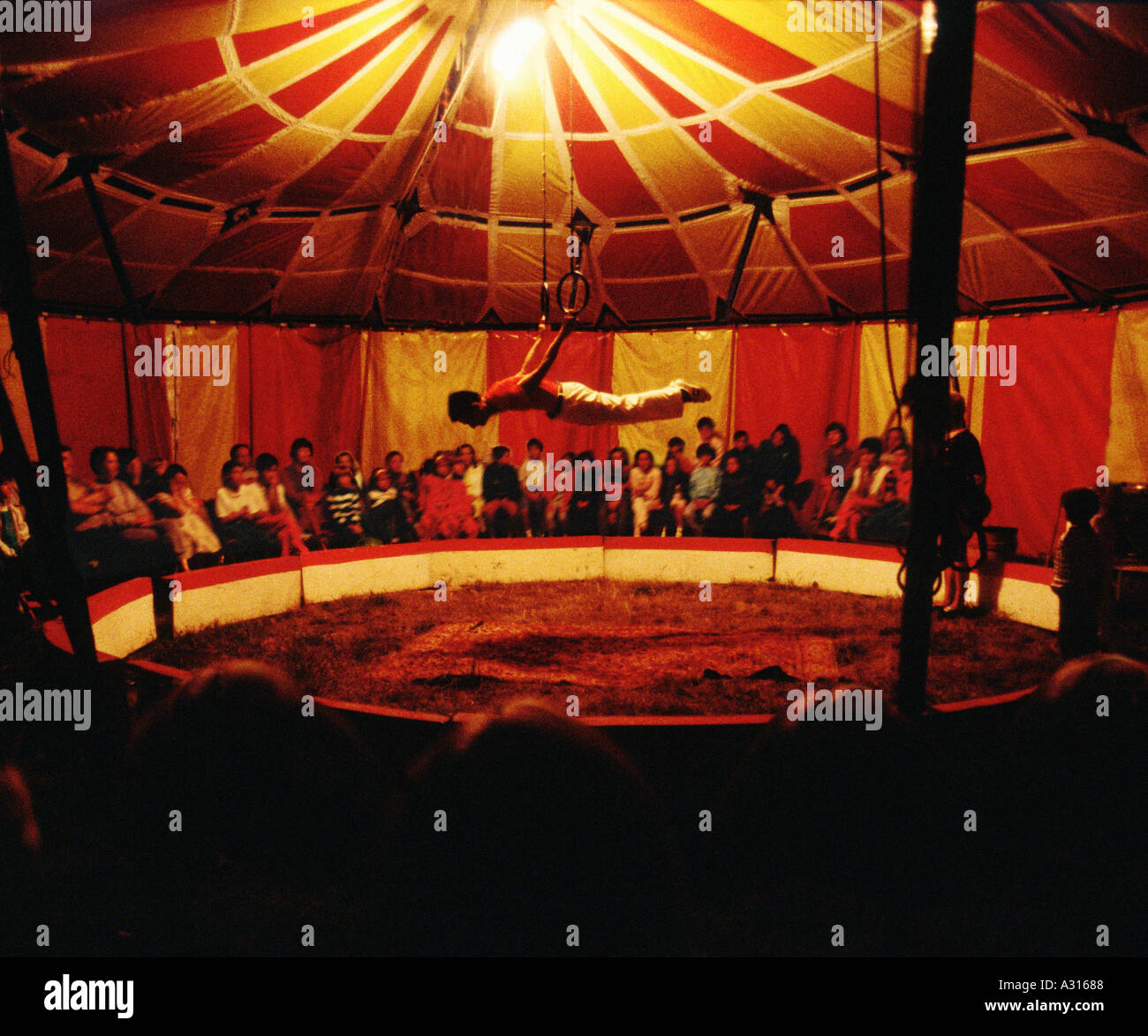 trapeze artist in balance in a small circus tent Stock Photo 202376