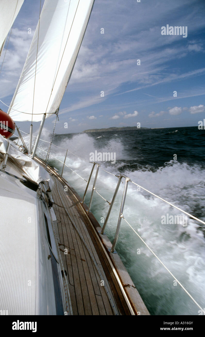 Yacht sailing in rough seas Stock Photo Alamy