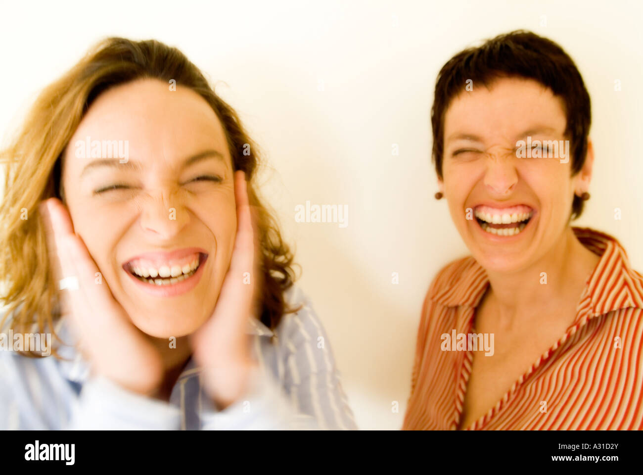 Two women looking at the camera and smiling Stock Photo