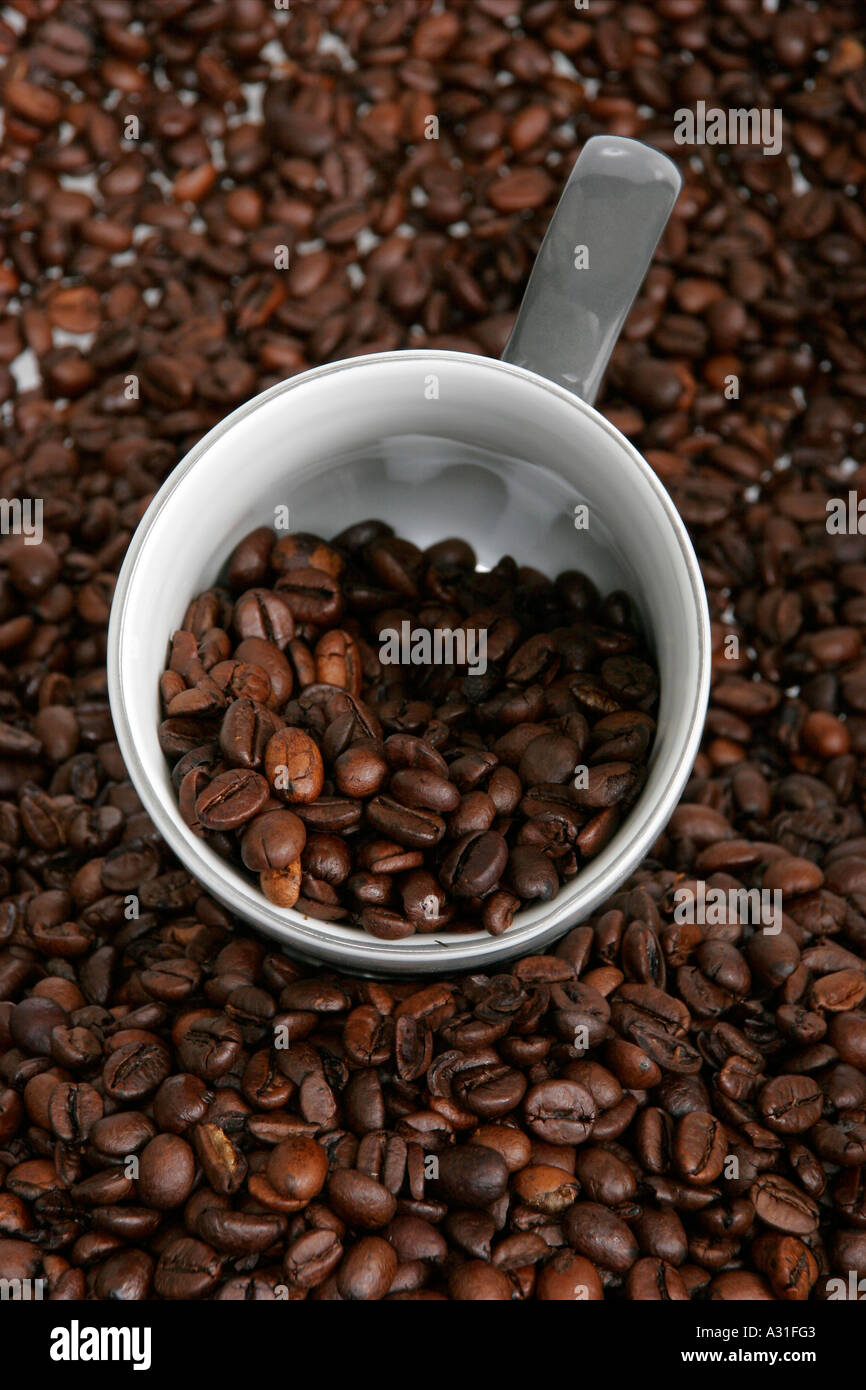 Cup and coffee beans elevated view Stock Photo