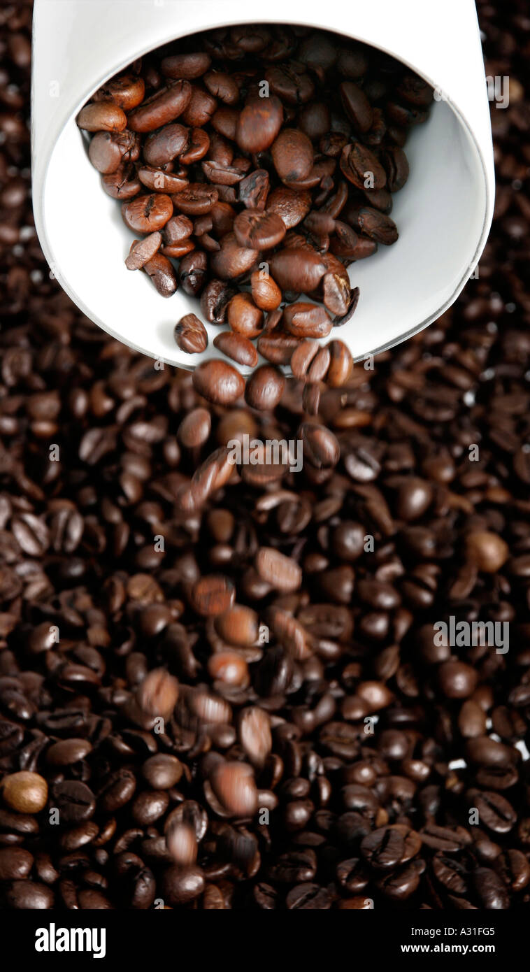 Cup and coffee beans elevated view Stock Photo