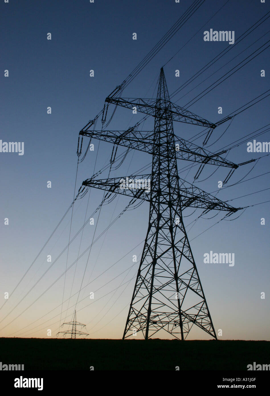 Electricity pylon and power lines low angle view Stock Photo