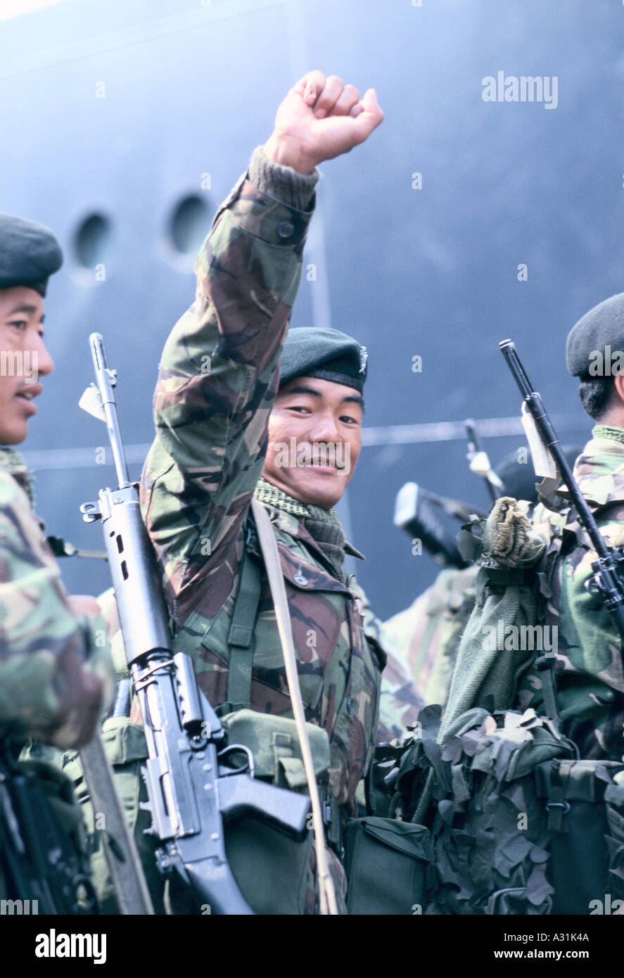 gurkha solider punching the air as he boards QE2 to depart for the Falklands Stock Photo