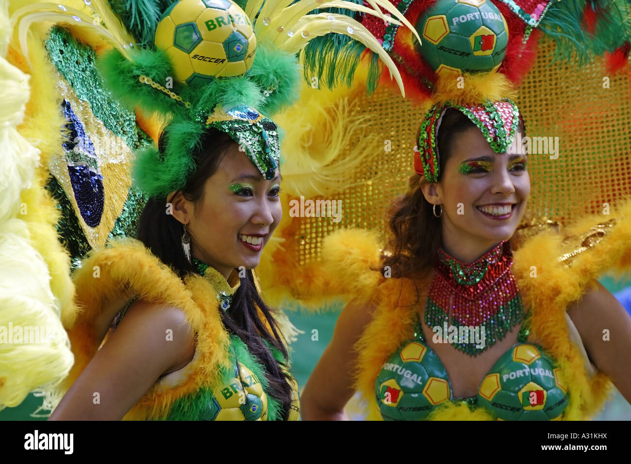 Brazilian and Portuguese girls in carnival costumes Stock Photo
