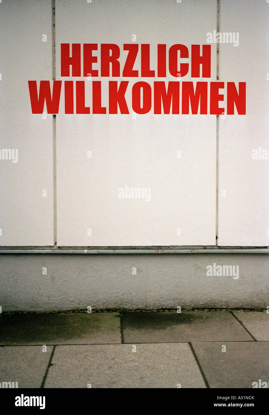 Herzlich Willkommen sign on building exterior Stock Photo