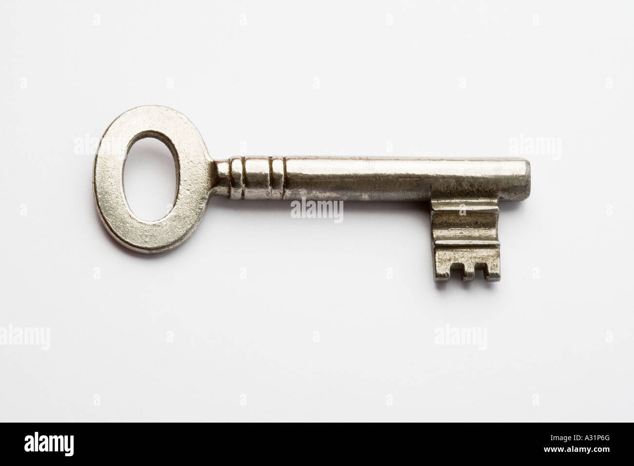 Old fashioned silver key Stock Photo - Alamy