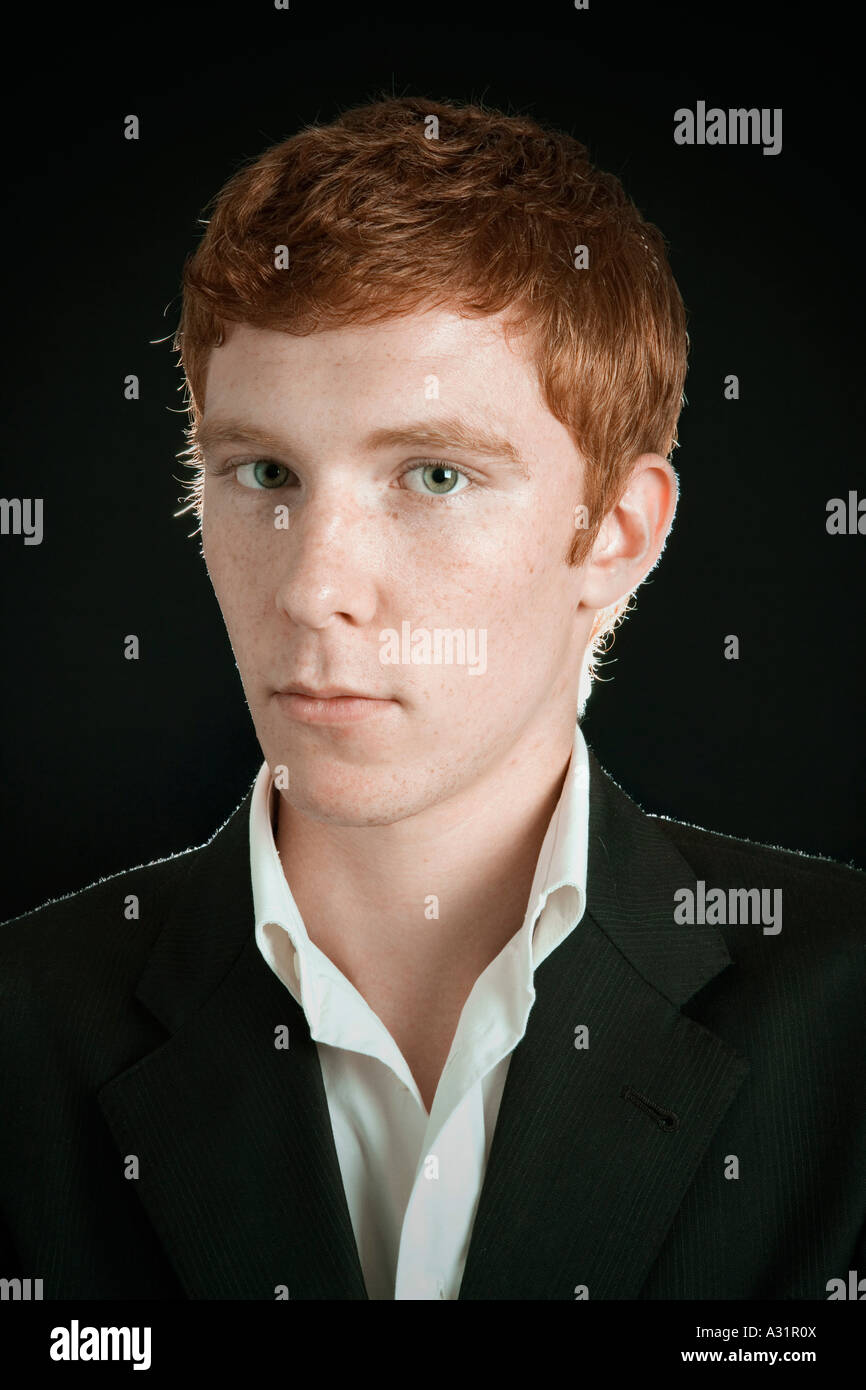 Young man with head turned Stock Photo